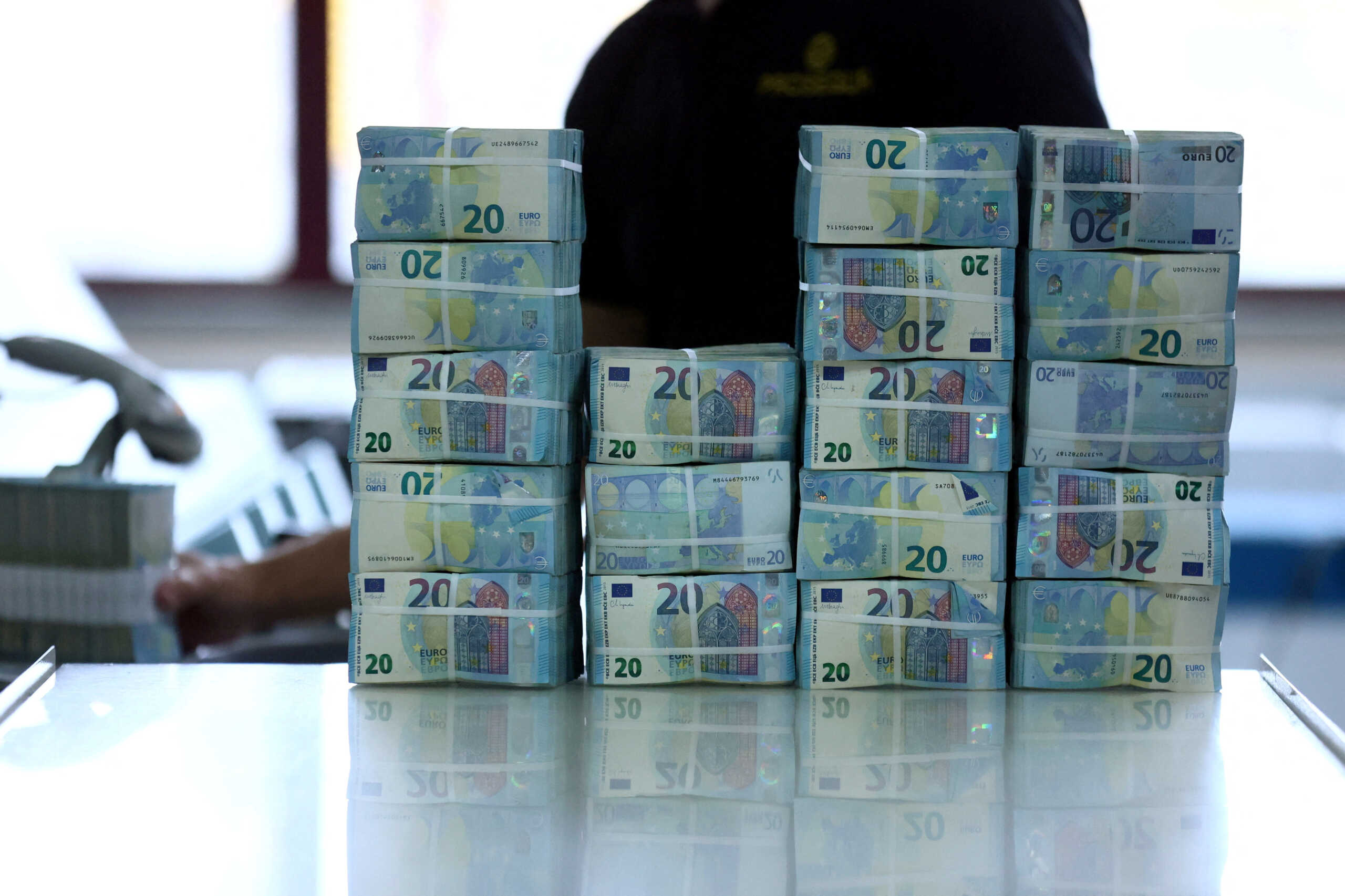 FILE PHOTO: Packs of 20-euro notes are seen at the Bank of Portugal fortified complex in Carregado, Alenquer, Portugal, May 17, 2022. Picture taken May 17, 2022. REUTERS