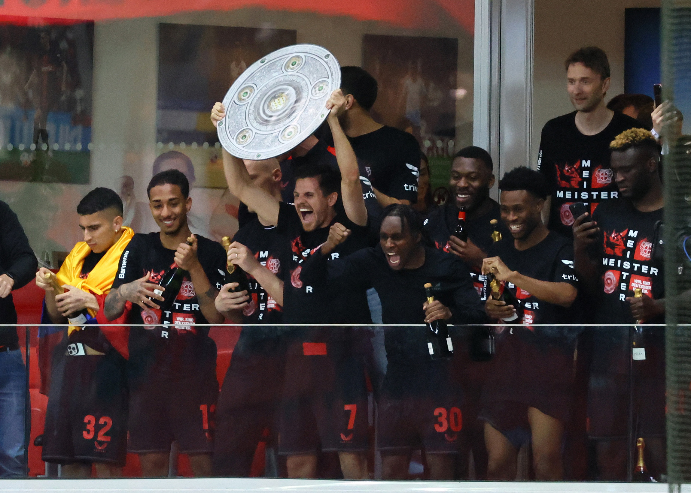 Soccer Football - Bundesliga - Bayer Leverkusen v Werder Bremen - BayArena, Leverkusen, Germany - April 14, 2024 Bayer Leverkusen players celebrate winning the Bundesliga REUTERS