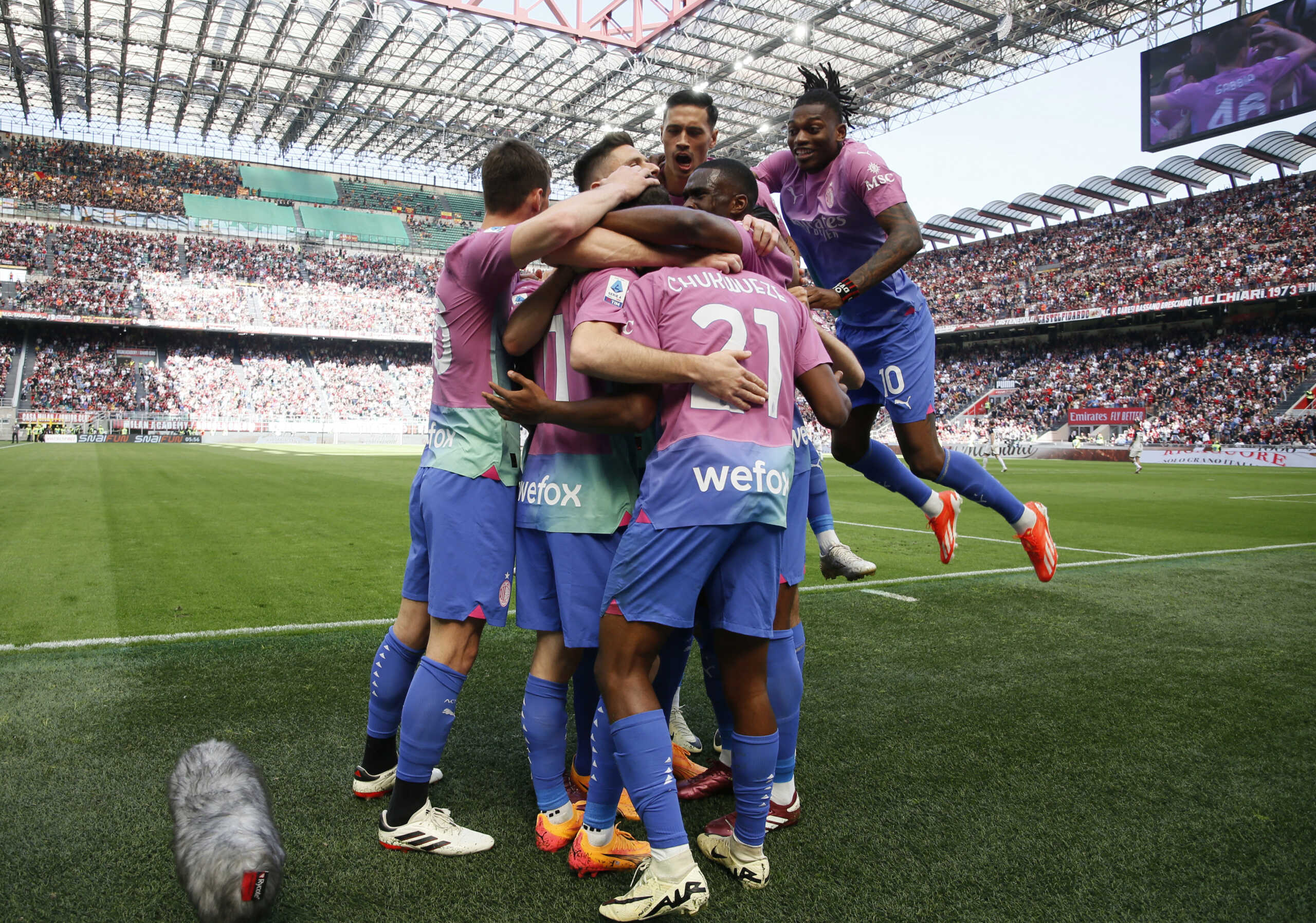 Soccer Football - Serie A - AC Milan v Lecce - San Siro, Milan, Italy - April 6, 2024 AC Milan's Christian Pulisic celebrates scoring their first goal with teammates REUTERS