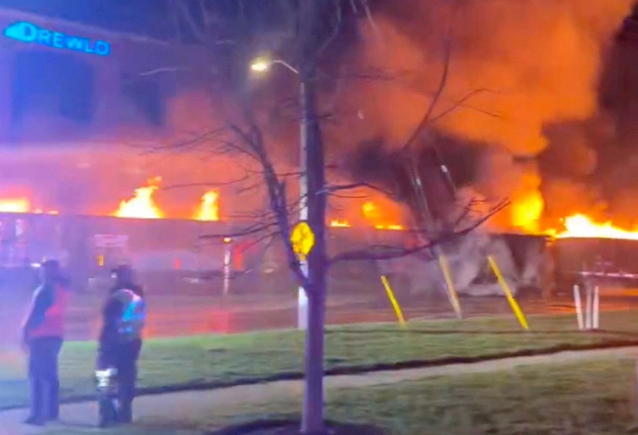 Fire burns on train cars, in London, Ontario, Canada, April 21, 2024, in this screengrab taken from a handout video. London Fire Department
