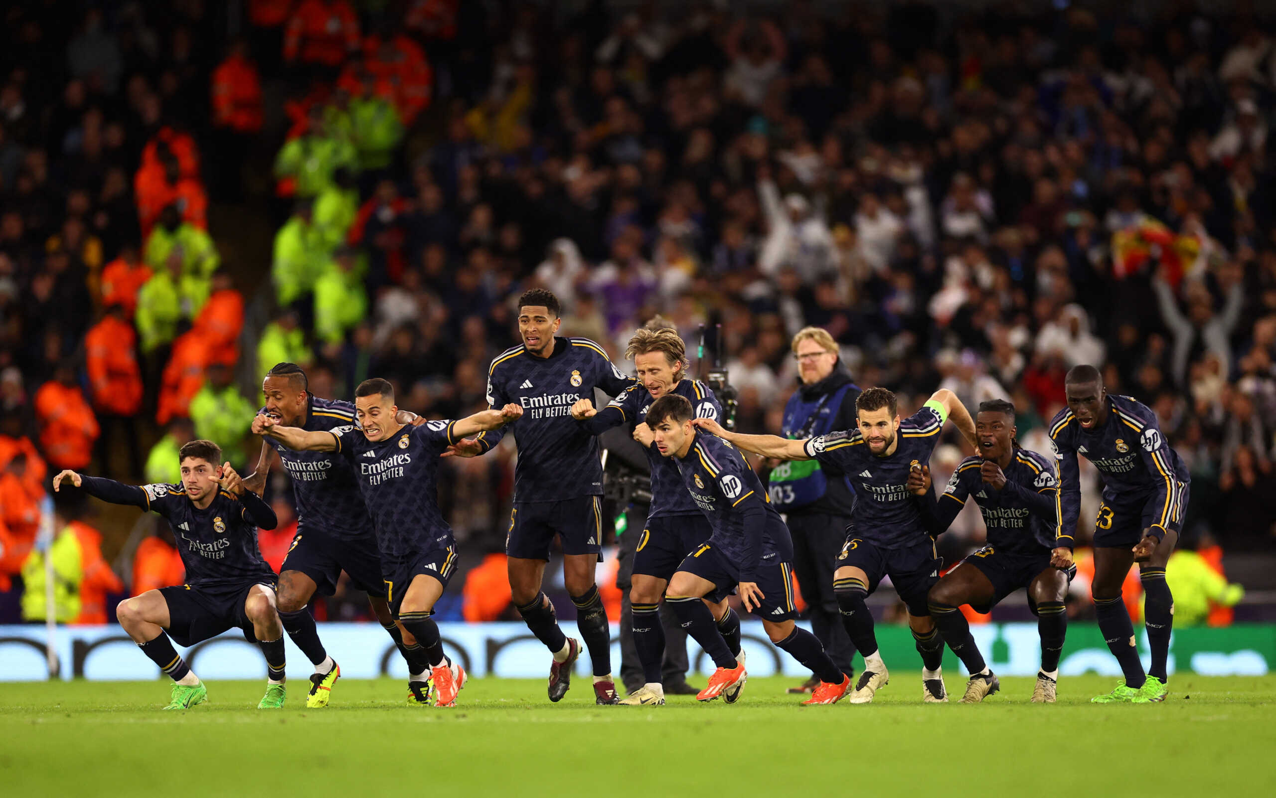 Soccer Football - Champions League - Quarter Final - Second Leg - Manchester City v Real Madrid - Etihad Stadium, Manchester, Britain - April 17, 2024 Real Madrid players celebrate winning the penalty shootout REUTERS