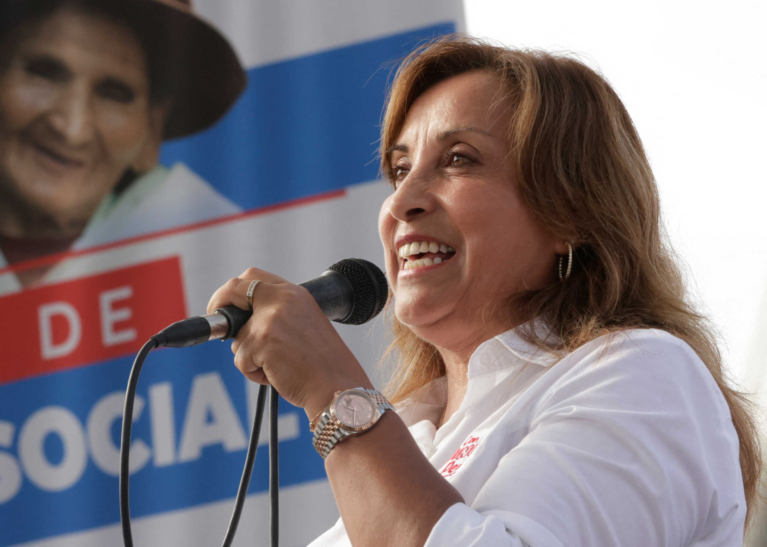 Peru's President Dina Boluarte, who is facing an enquiry into possible illicit enrichment and failure to declare ownership of luxury watches, addresses the audience during an assistance program for the elderly, in Lima, Peru February 22, 2024. Luis Iparraguirre