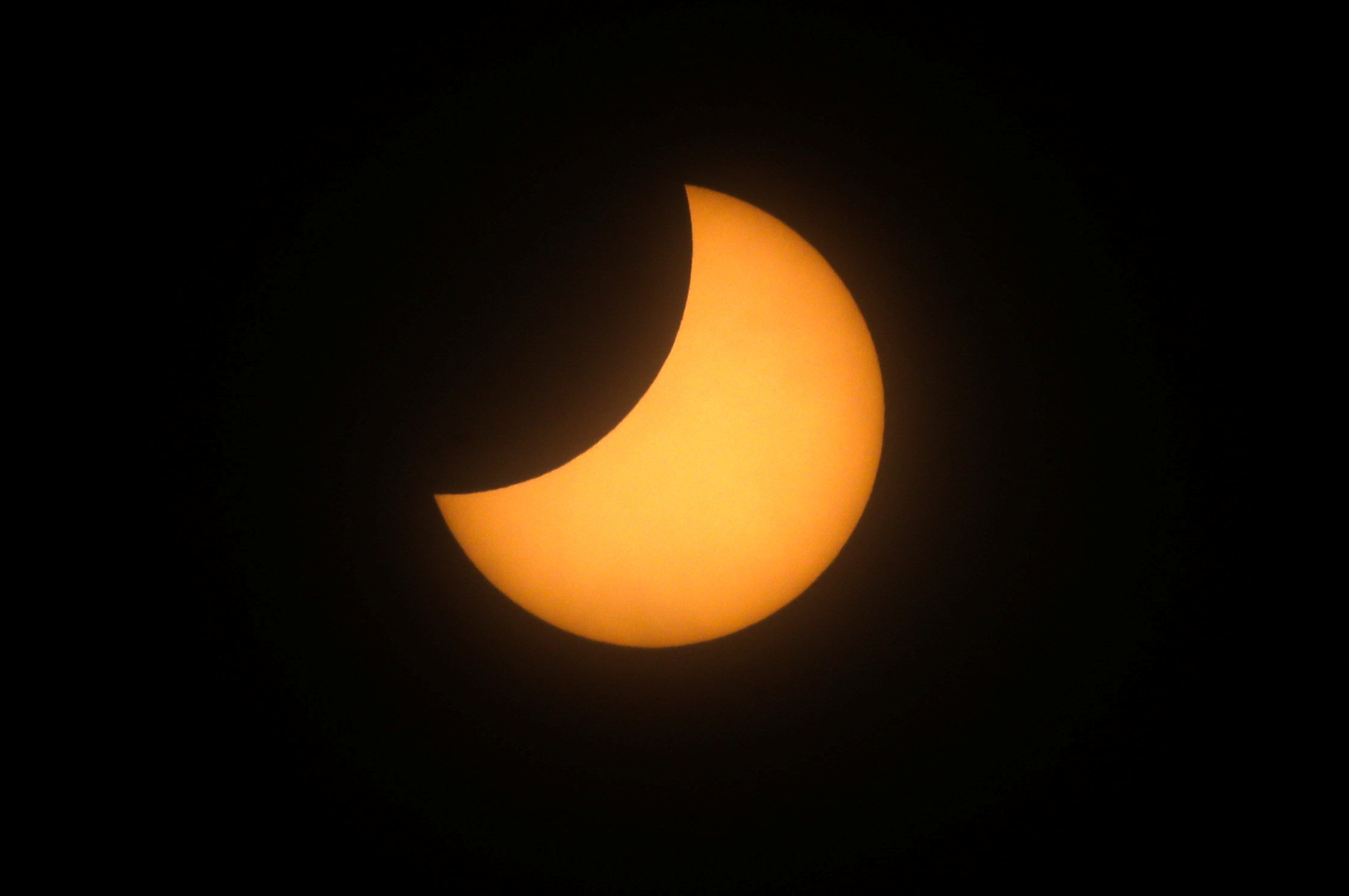 A partial solar eclipse is seen from Mazatlan, Mexico April 8, 2024. REUTERS