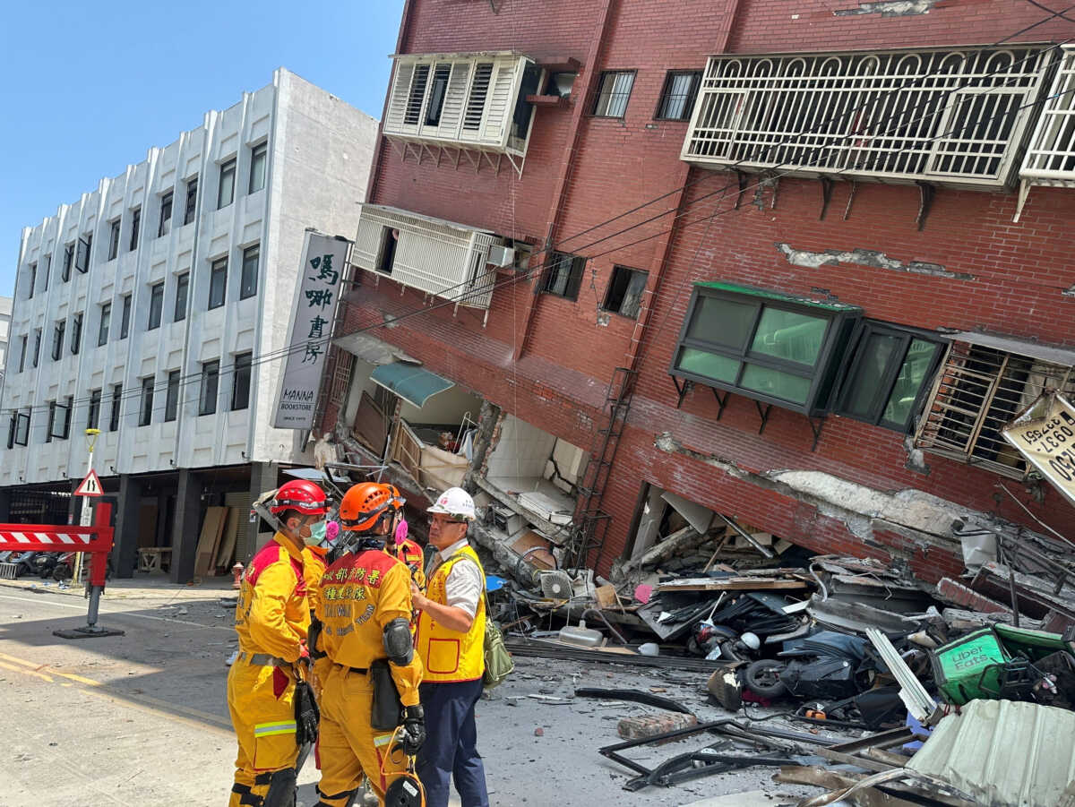 Firefighters work at the site where a building collapsed following the earthquake, in Hualien, Taiwan, in this handout provided by Taiwan's National Fire Agency on April 3, 2024. Taiwan National Fire Agency