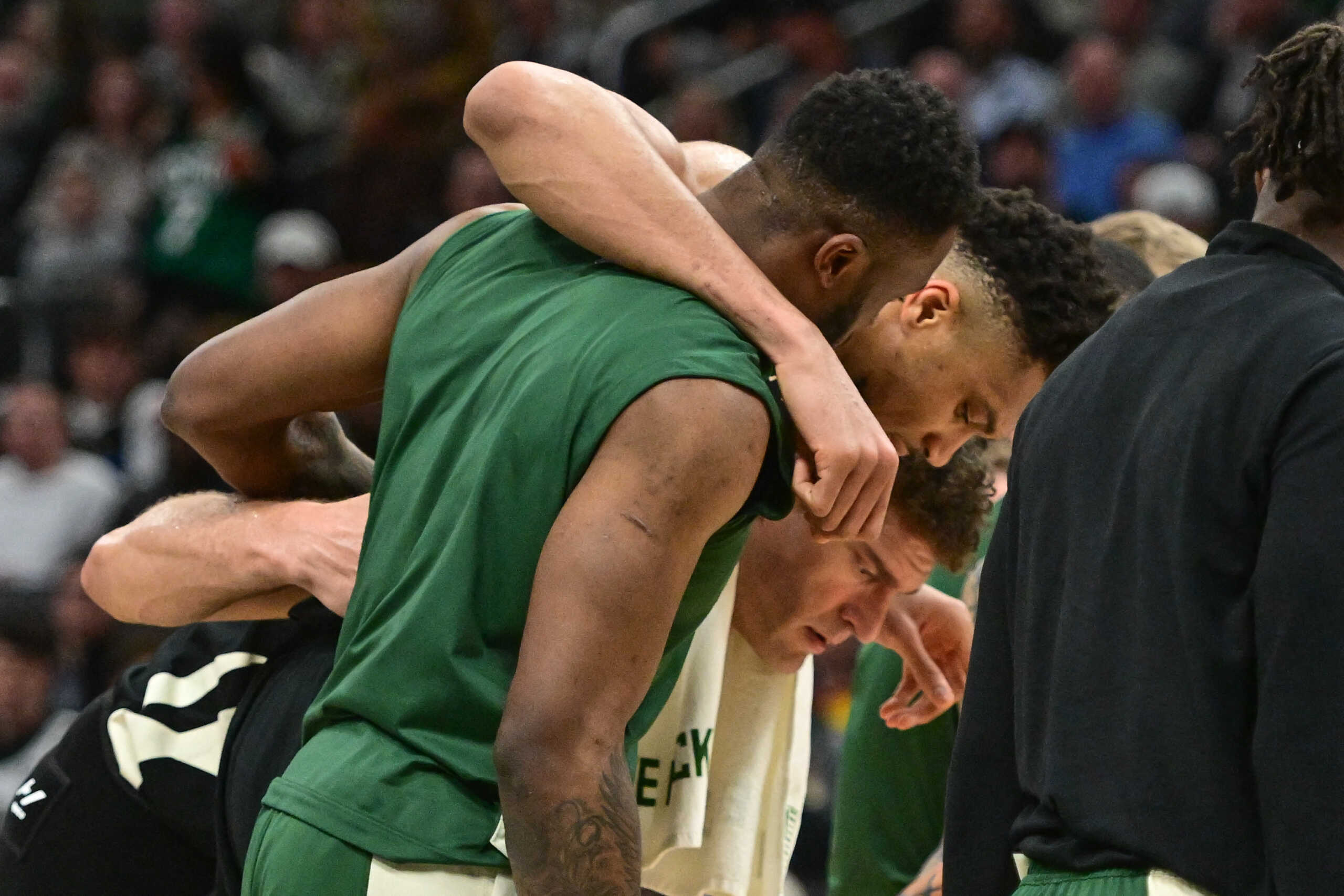 Apr 9, 2024; Milwaukee, Wisconsin, USA;  Milwaukee Bucks forward Giannis Antetokounmpo (34) leaves the game against the Boston Celtics with an injury in the third quarter at Fiserv Forum. Mandatory Credit: Benny Sieu-USA TODAY Sports