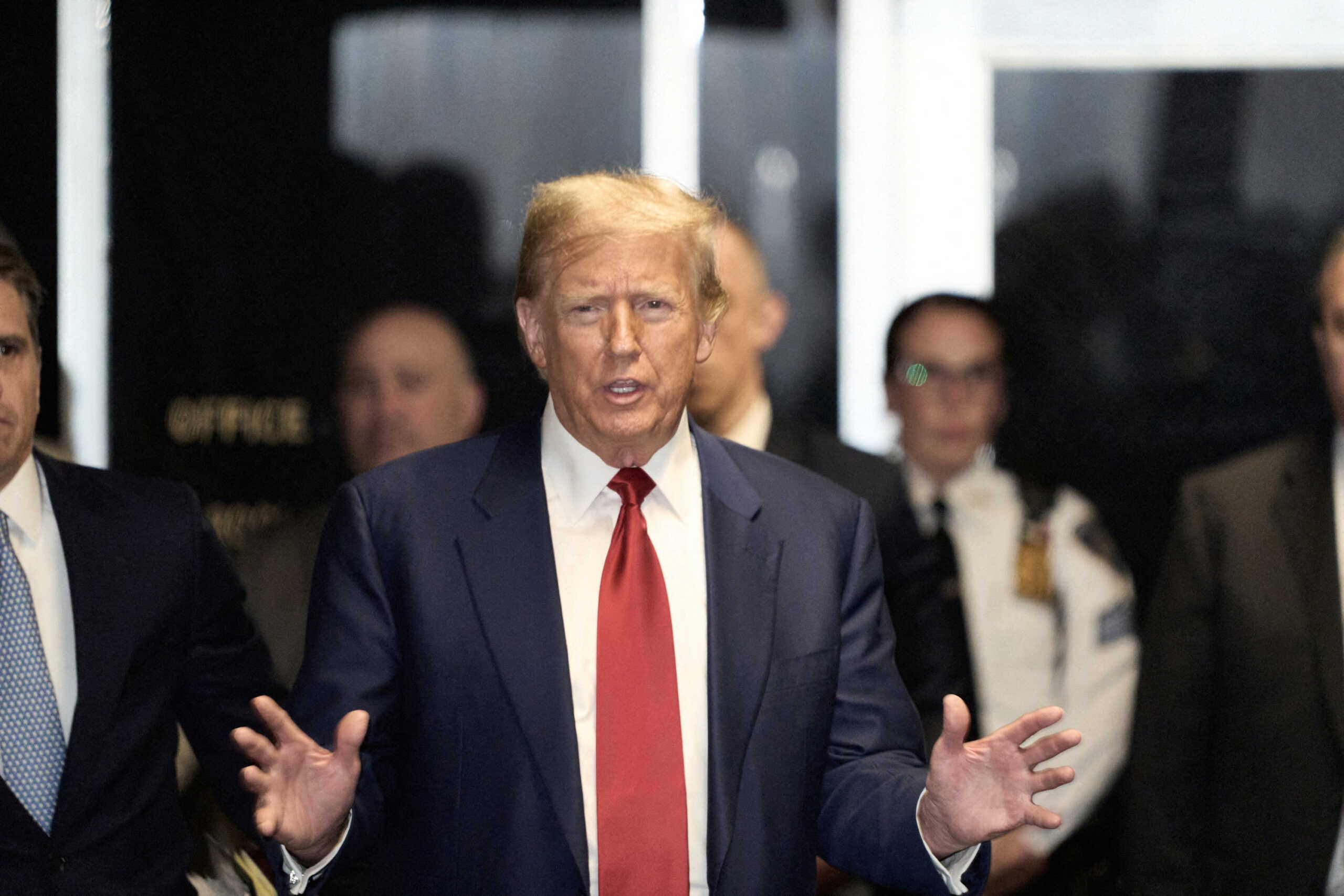 FILE PHOTO: Former U.S. President Donald Trump leaves Manhattan Criminal court after a hearing in the upcoming hush money trial, in New York City, U.S., March 25, 2024. Curtis Means