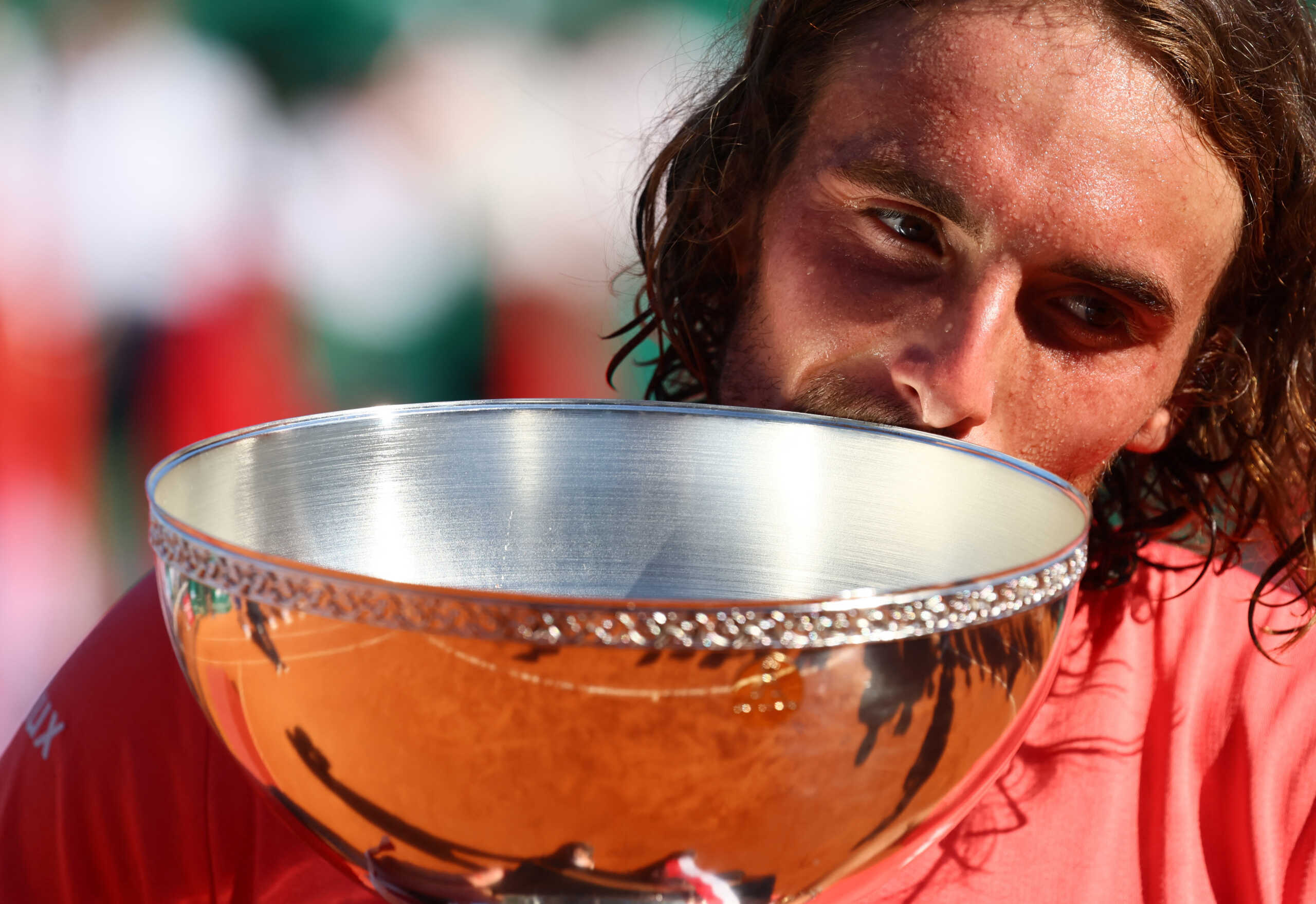 Tennis - ATP Masters 1000 - Monte Carlo Masters - Monte Carlo Country Club, Roquebrune-Cap-Martin, France - April 14, 2024 Greece's Stefanos Tsitsipas celebrates with the trophy after winning his final match against Norway's Casper Ruud REUTERS
