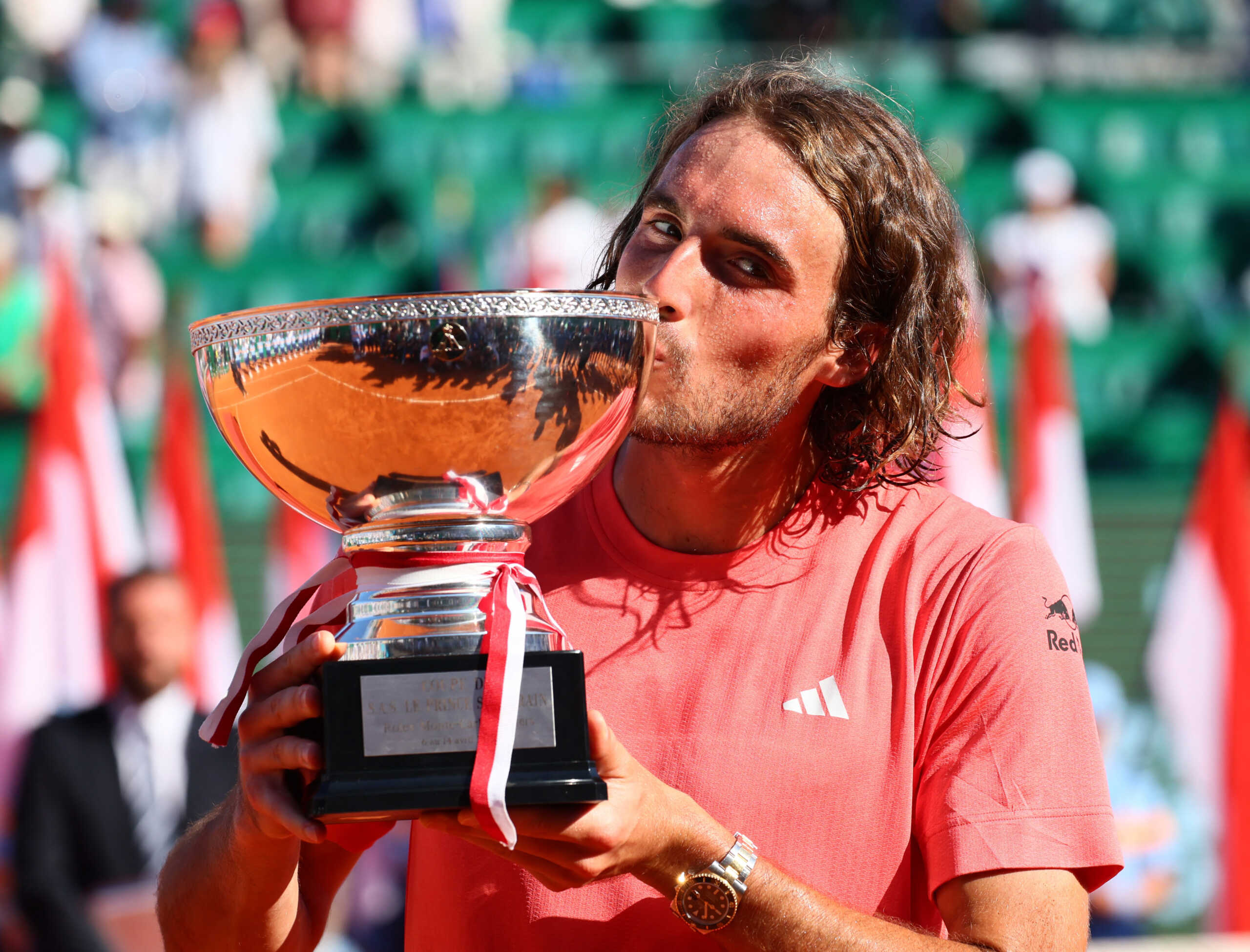 Tennis - ATP Masters 1000 - Monte Carlo Masters - Monte Carlo Country Club, Roquebrune-Cap-Martin, France - April 14, 2024 Greece's Stefanos Tsitsipas celebrates with the trophy after winning his final match against Norway's Casper Ruud REUTERS