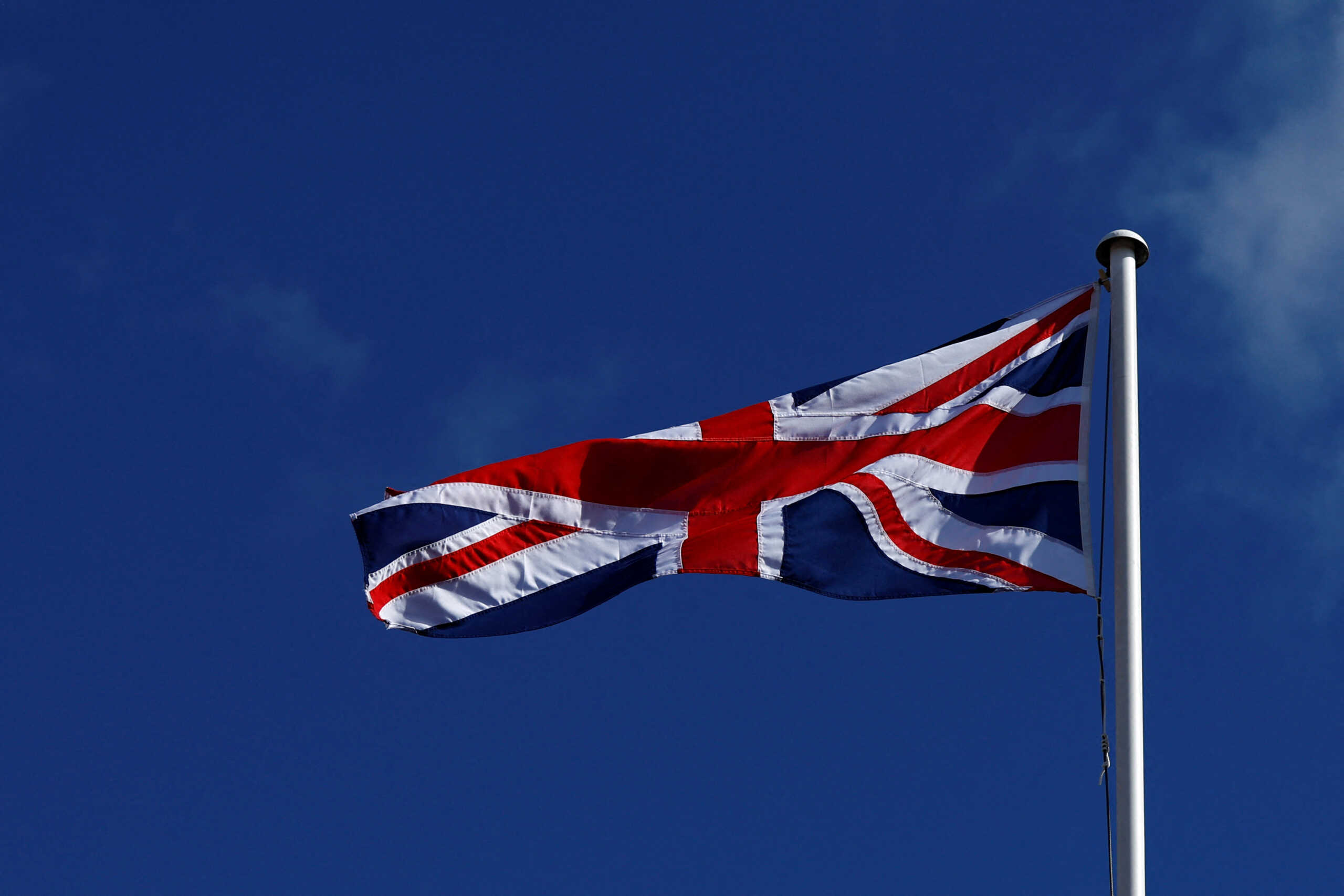 A British flag flies outside the Democratic Unionist Party (DUP) headquarters on the day of Jeffrey Donaldson's resignation as DUP party leader, in Belfast, Northern Ireland, March 29, 2024. REUTERS