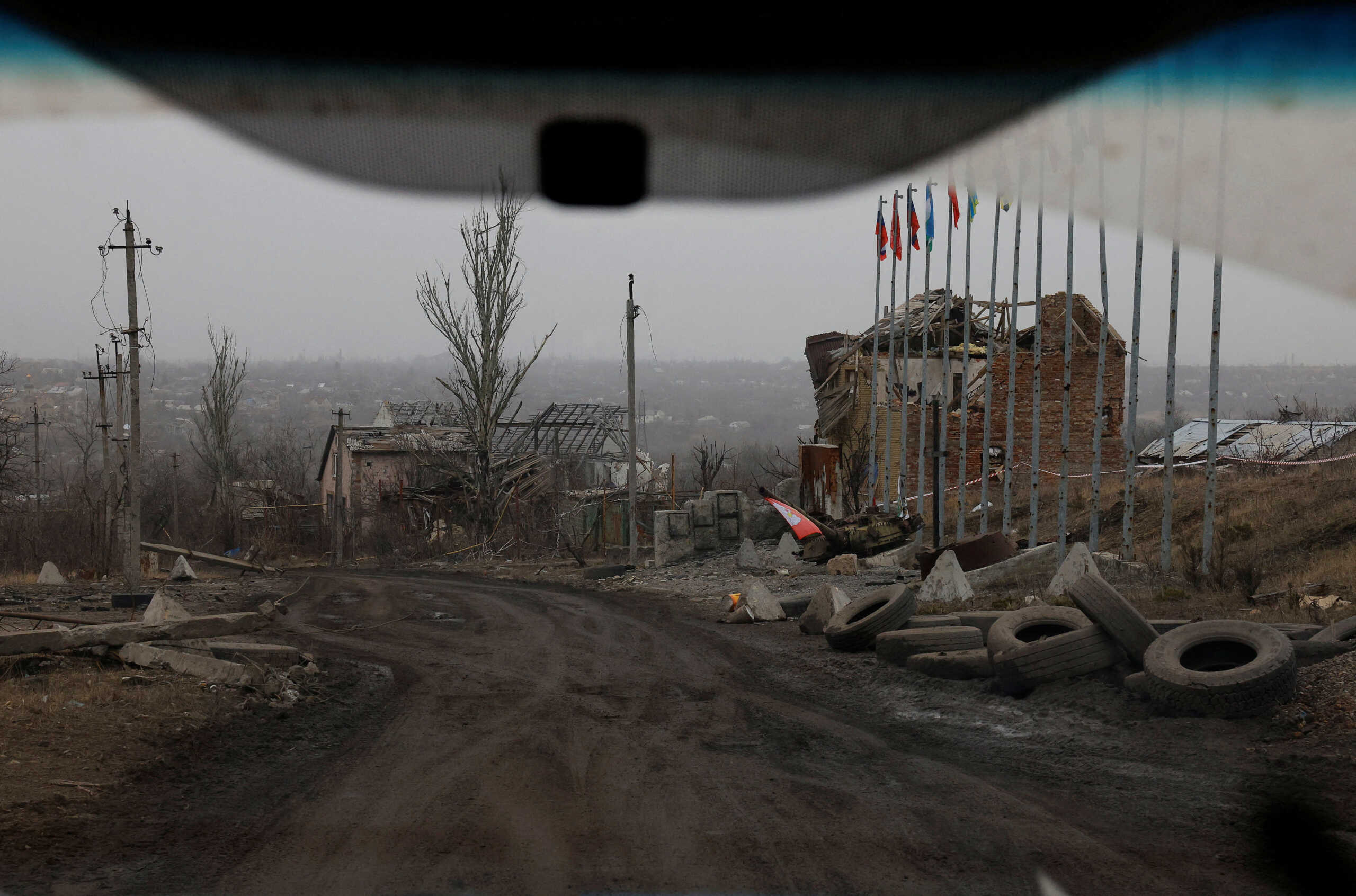 FILE PHOTO: A view from a car shows buildings destroyed in the course of Russia-Ukraine conflict in the town of Avdiivka in the Donetsk Region, Russian-controlled Ukraine, March 16, 2024. REUTERS