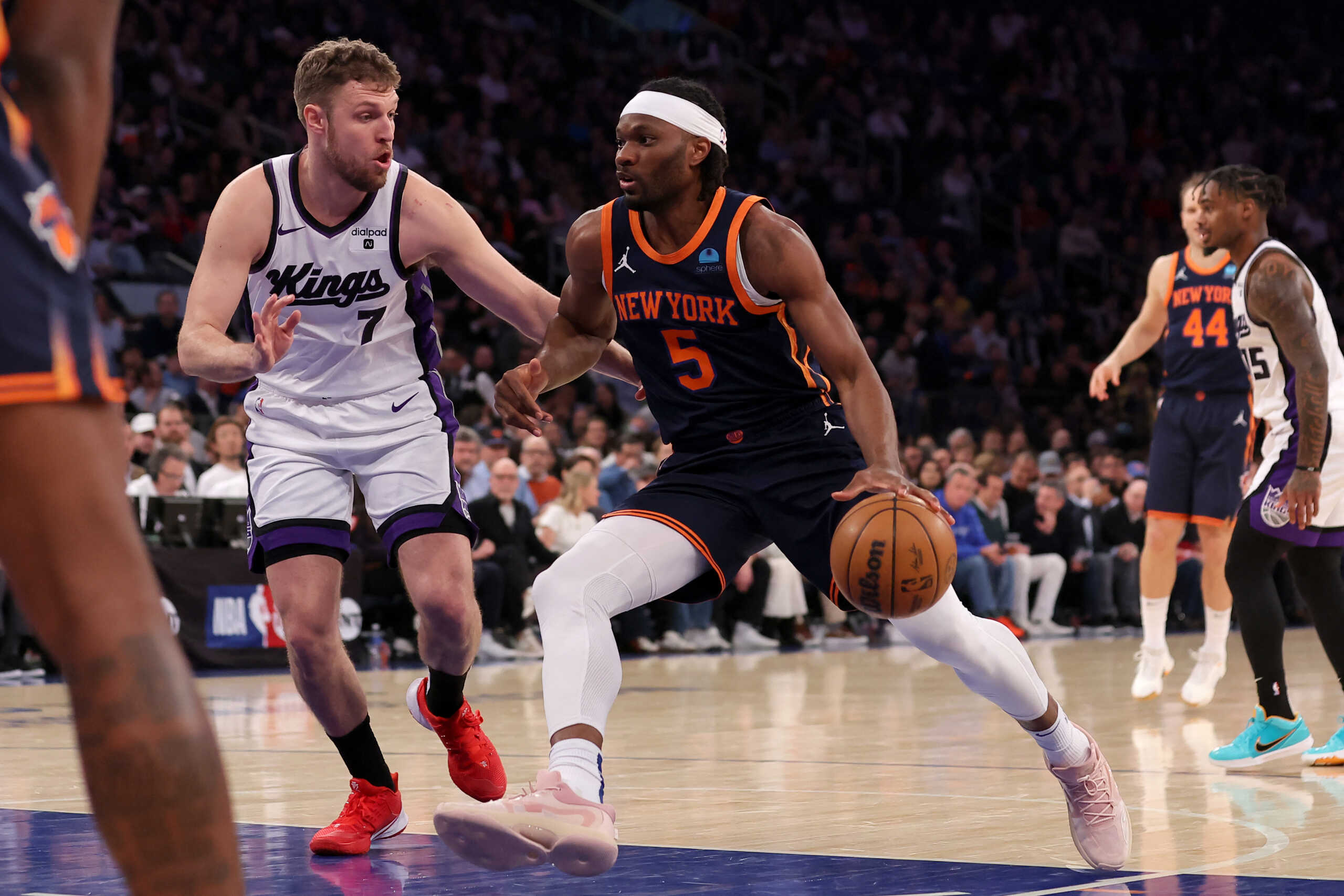Apr 4, 2024; New York, New York, USA; New York Knicks forward Precious Achiuwa (5) drives to the basket against Sacramento Kings forward Sasha Vezenkov (7) during the second quarter at Madison Square Garden. Mandatory Credit: Brad Penner-USA TODAY Sports