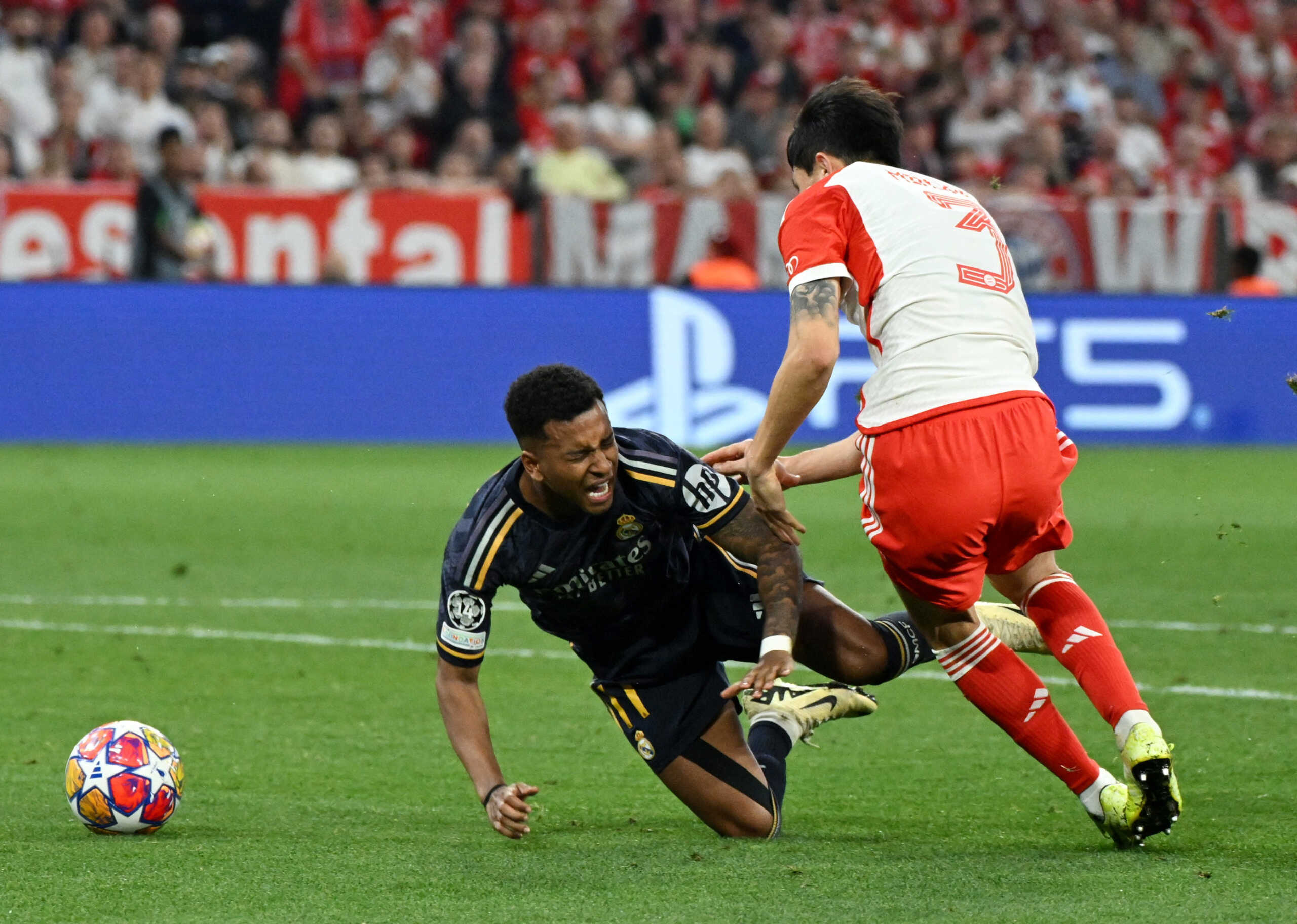 Soccer Football - Champions League - Semi Final - First Leg - Bayern Munich v Real Madrid - Allianz Arena, Munich, Germany - April 30, 2024 Bayern Munich's Kim Min-jae fouls Real Madrid's Rodrygo to concede a penalty REUTERS