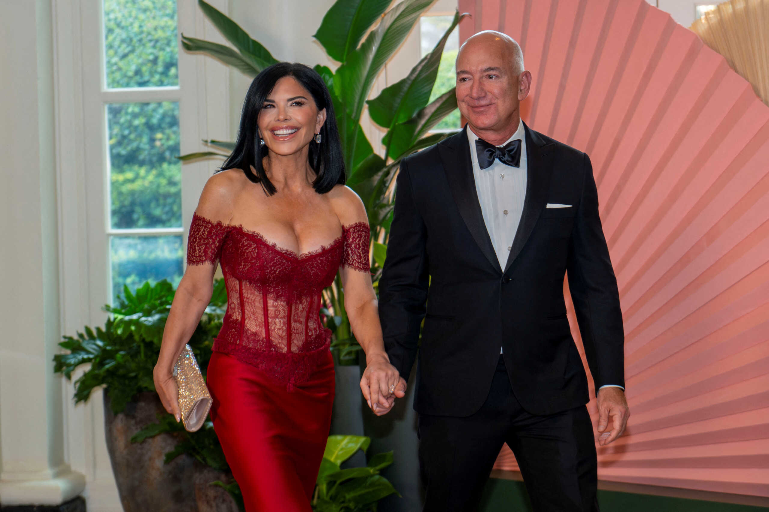 Amazon CEO Jeff Bezos and Lauren Sanchez arrive for an official State Dinner held by U.S. President Joe Biden in honor of Japanese Prime Minister Fumio Kishida at the White House in Washington, U.S., April 10, 2024. REUTERS