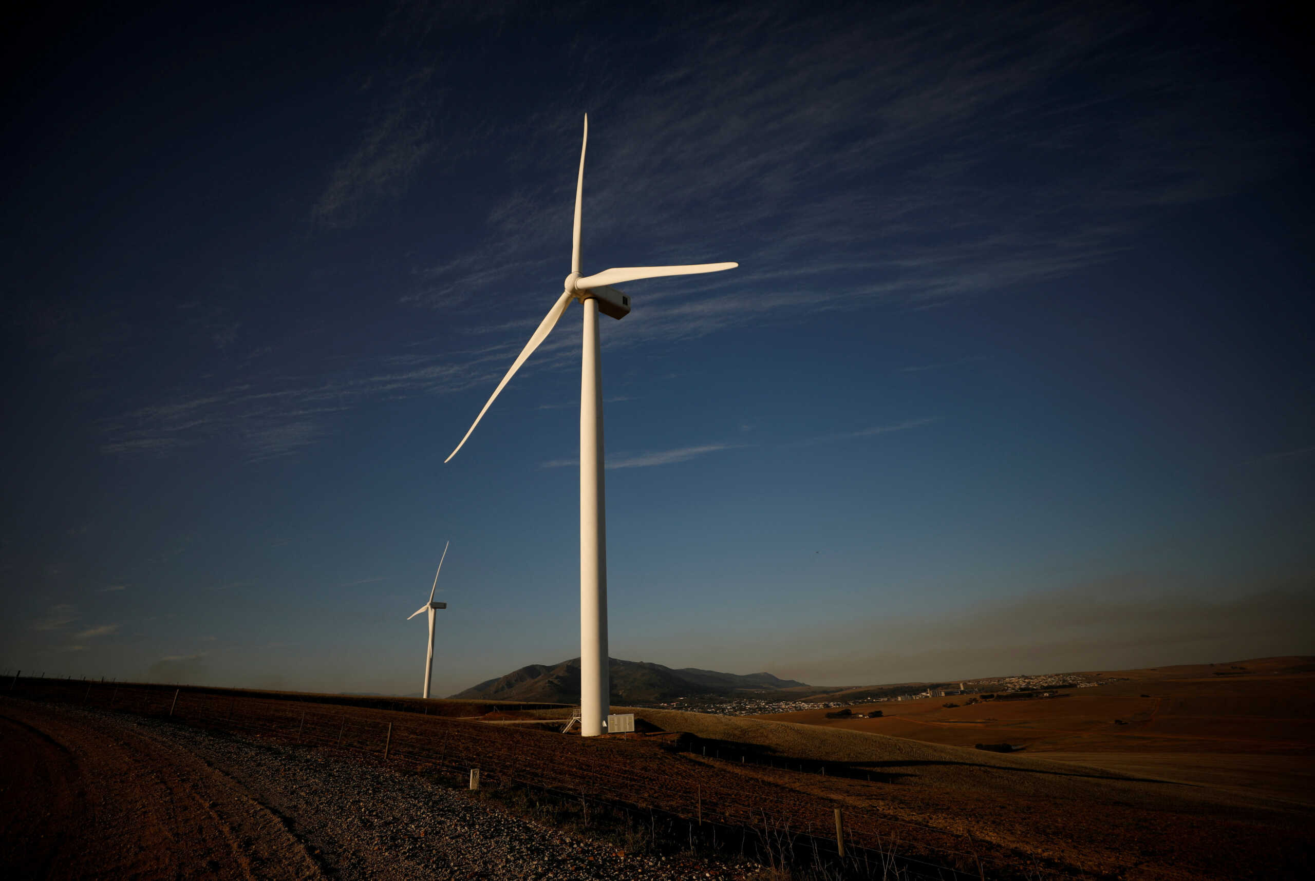 FILE PHOTO: Wind turbines produce renewable energy outside Caledon, South Africa, May 20, 2020. Picture taken May 20, 2020. REUTERS