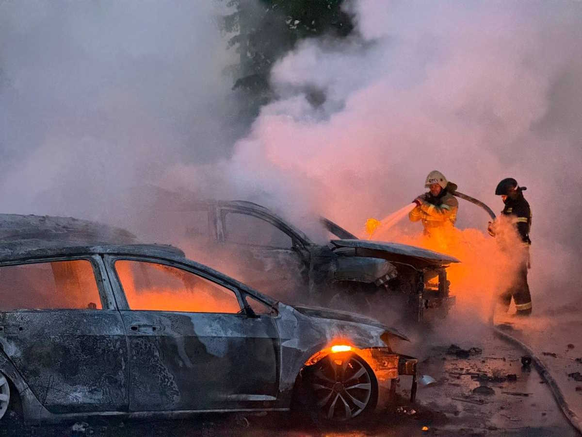 Firefighters work at the site of a military strike, what local authorities called a Ukrainian air attack, in the course of Russia-Ukraine conflict in Belgorod, Russia, May 9, 2024. Governor of Russia's Belgorod Region Vyacheslav Gladkov via Telegram