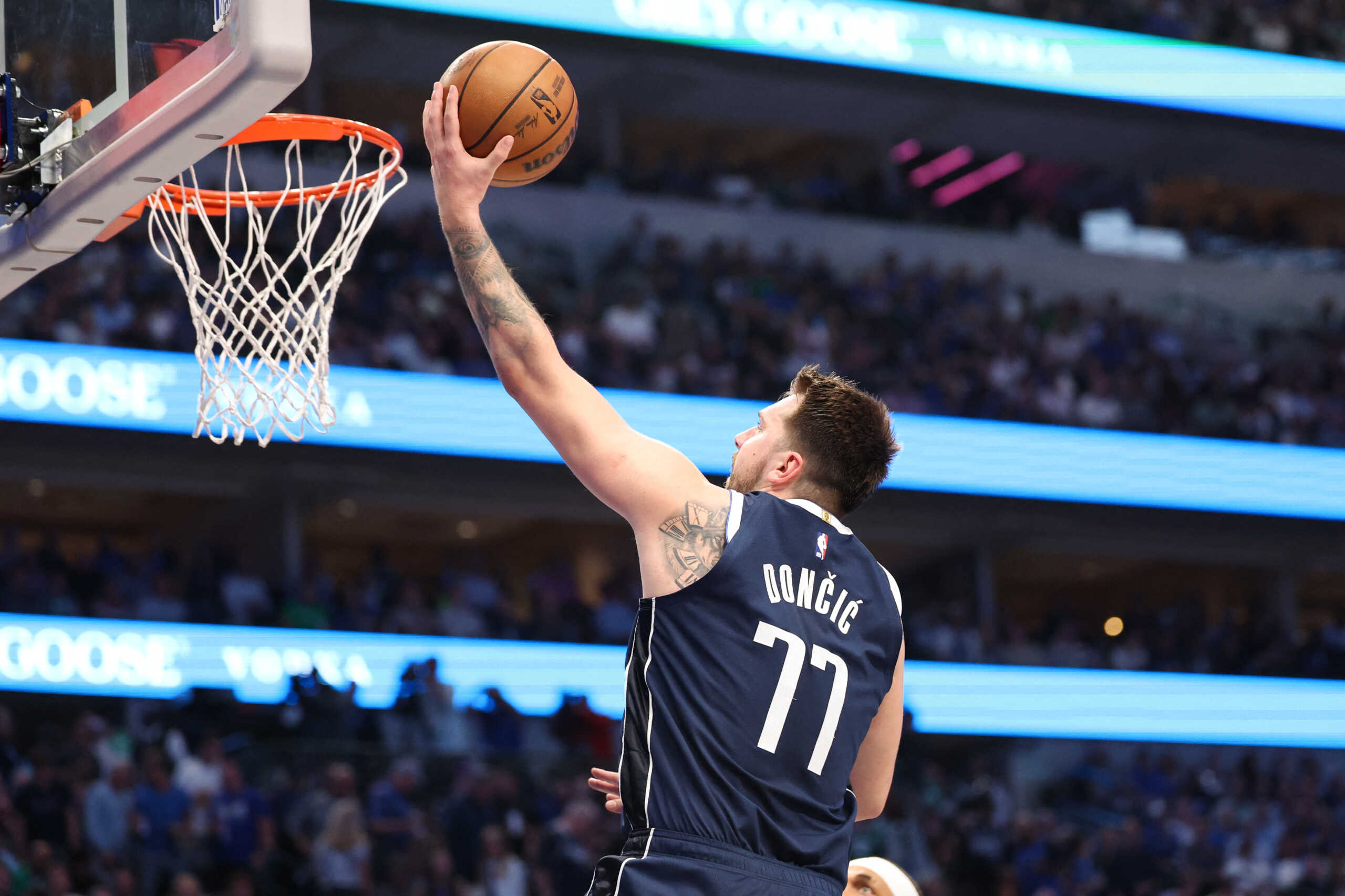 May 28, 2024; Dallas, Texas, USA; Dallas Mavericks guard Luka Doncic (77) shoots a layup against the Minnesota Timberwolves during the third quarter in game four of the western conference finals for the 2024 NBA playoffs at American Airlines Center. Mandatory Credit: Kevin Jairaj-USA TODAY Sports