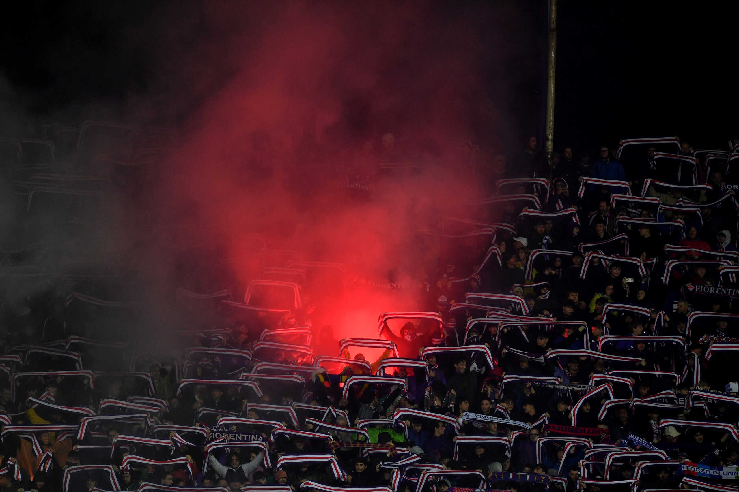 Soccer Football - Europa Conference League - Semi Final - First Leg - Fiorentina v Club Brugge - Stadio Artemio Franchi, Florence, Italy - May 2, 2024 Fiorentina fans with flares inside the stadium before the match REUTERS