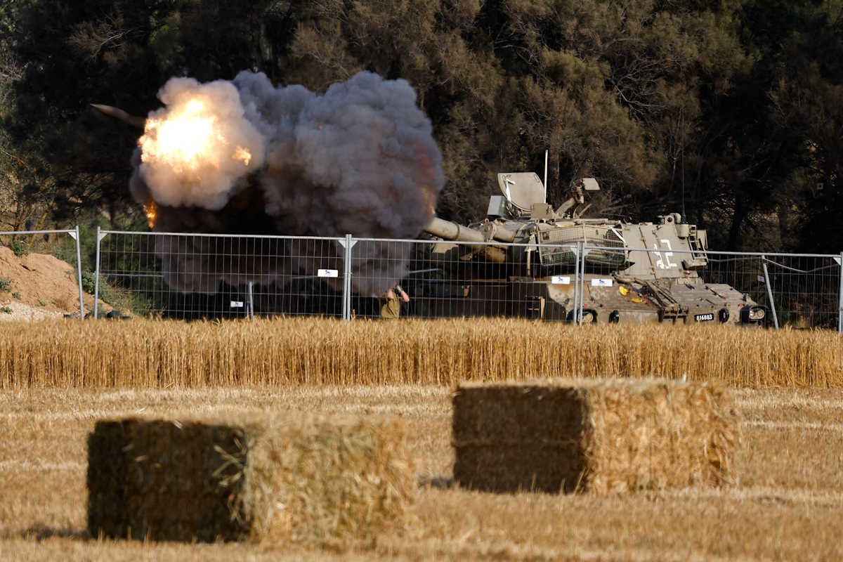 An Israeli mobile artillery unit fires towards Gaza, amid the ongoing conflict between Israel and the Palestinian Islamist group Hamas, near the Israel-Gaza border, in Israel, April 30, 2024. REUTERS