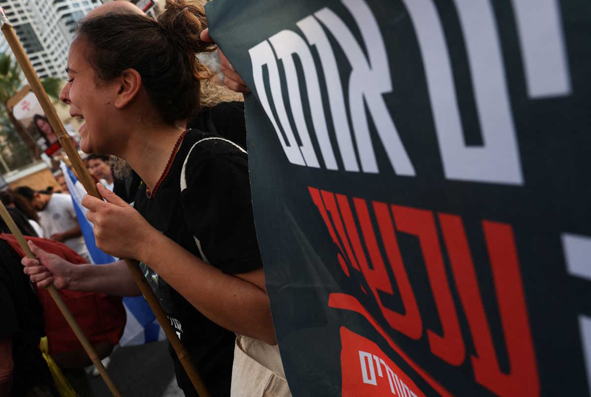 A woman reacts during a protest calling for the release of hostages kidnapped in the deadly October 7 attack on Israel by the Palestinian Islamist group Hamas from Gaza, in Tel Aviv, Israel, May 2, 2024. REUTERS