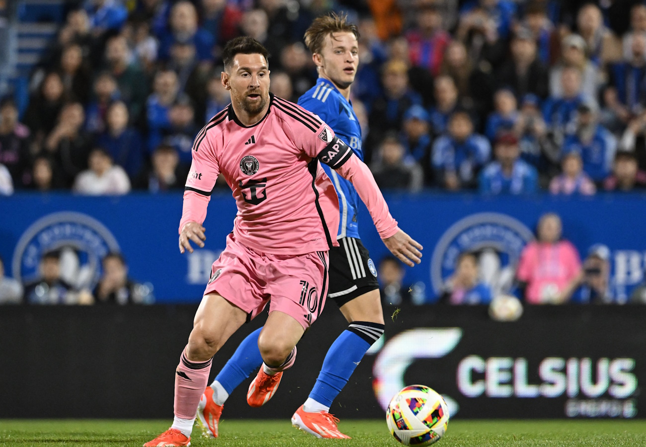 May 11, 2024; Montreal, Quebec, CAN; Inter Miami CF forward Lionel Messi (10) controls the ball against CF Montreal midfielder Bryce Duke (10) in the first half at Stade Saputo. Mandatory Credit: David Kirouac-USA TODAY Sports