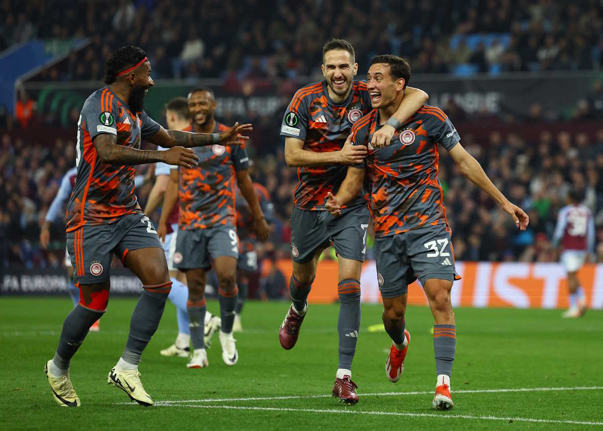 Soccer Football - Europa Conference League - Semi Final - First Leg - Aston Villa v Olympiacos - Villa Park, Birmingham, Britain - May 2, 2024  Olympiacos' Santiago Hezze celebrates scoring their fourth goal with Rodinei and Kostas Fortounis Action Images via Reuters