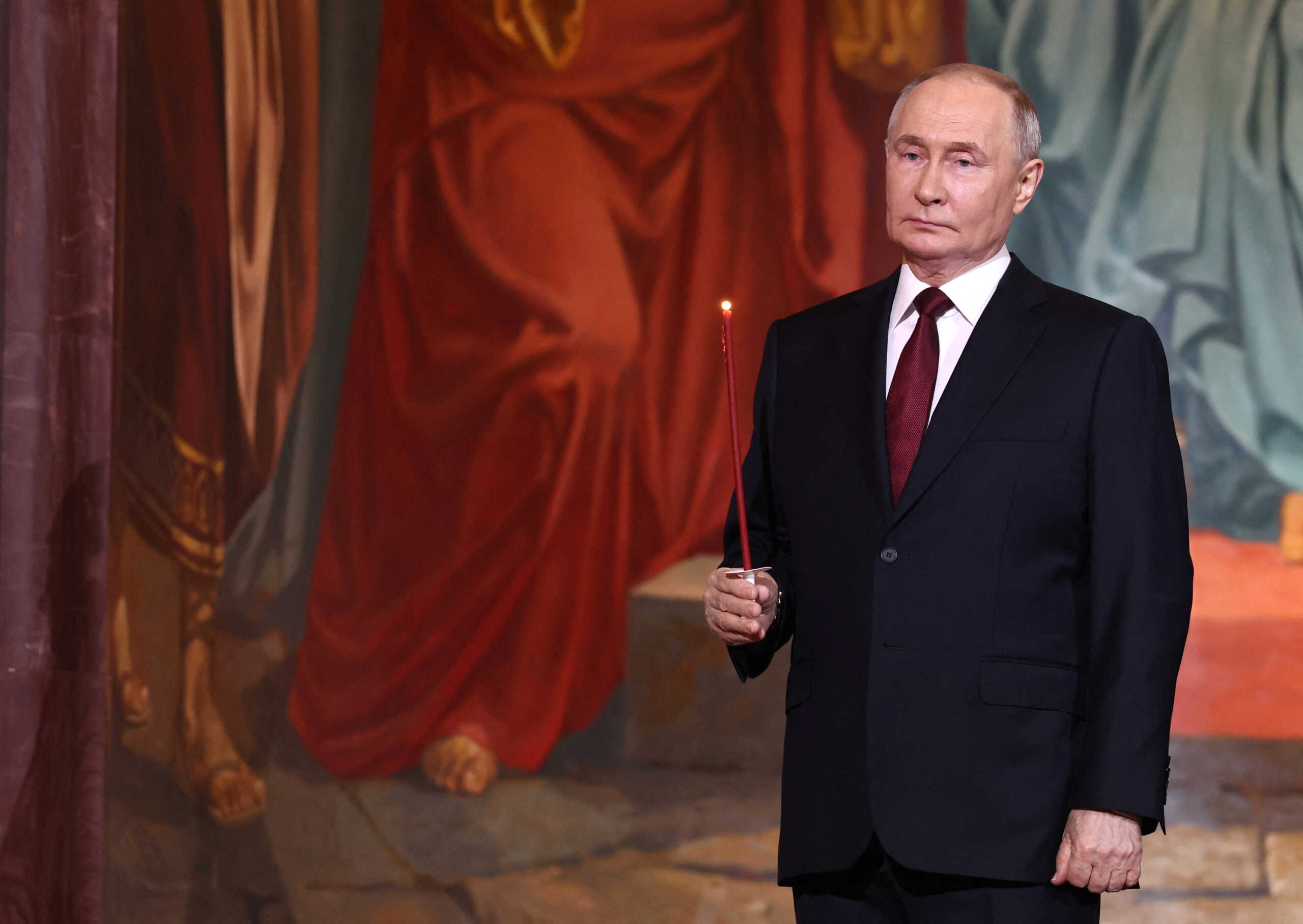 Russian President Vladimir Putin attends the Orthodox Easter service at the Cathedral of Christ the Saviour in Moscow, Russia, May 5, 2024. Sputnik
