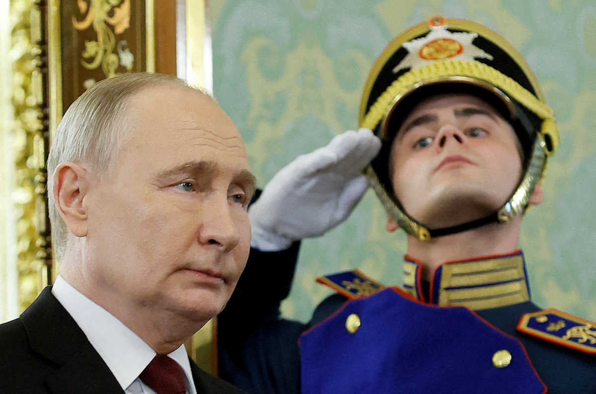 FILE PHOTO: Russian President Vladimir Putin walks past an honour guard as he attends a meeting with Cuban President Miguel Diaz-Canel in Moscow, Russia, May 9, 2024. REUTERS