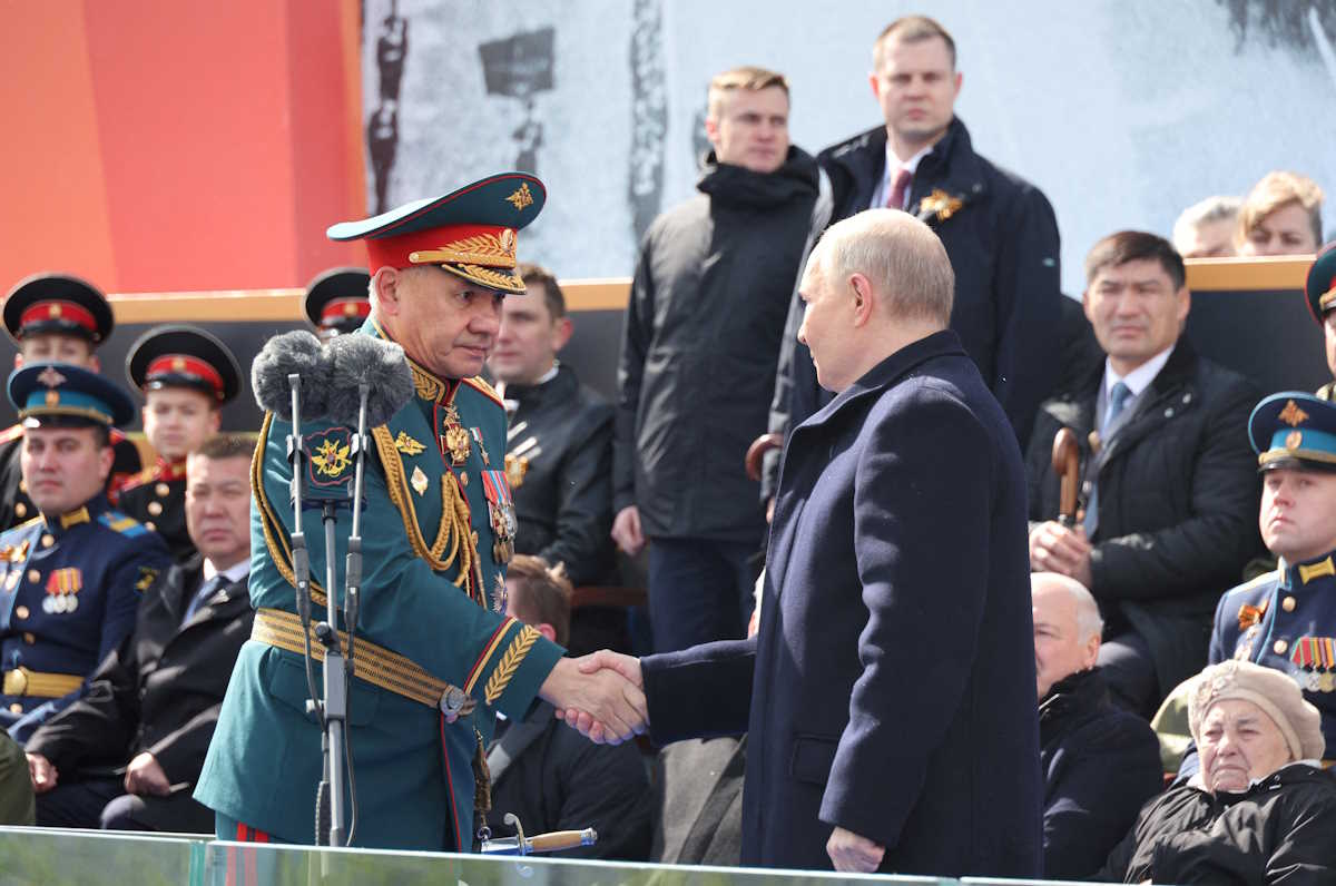 FILE PHOTO: Russian President Vladimir Putin and Defence Minister Sergei Shoigu attend a military parade on Victory Day, which marks the 79th anniversary of the victory over Nazi Germany in World War Two, in Red Square in Moscow, Russia, May 9, 2024. Sputnik