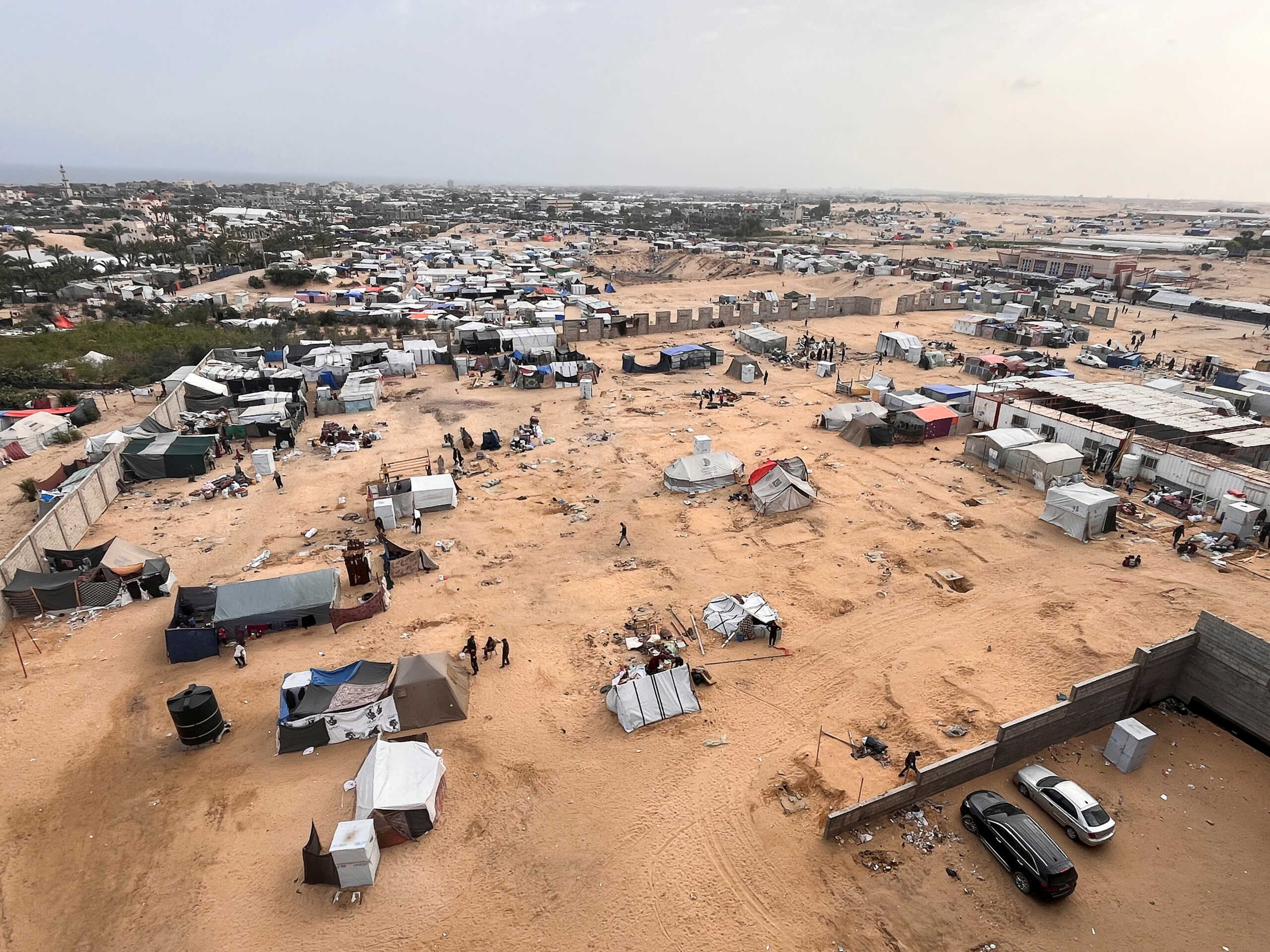Displaced Palestinians prepare to evacuate a tent camp, after Israeli forces launched a ground and air operation in the eastern part of Rafah, amid ongoing conflict between Israel and the Palestinian Islamist group Hamas, in Rafah, in the southern Gaza Strip, May 11, 2024. REUTERS