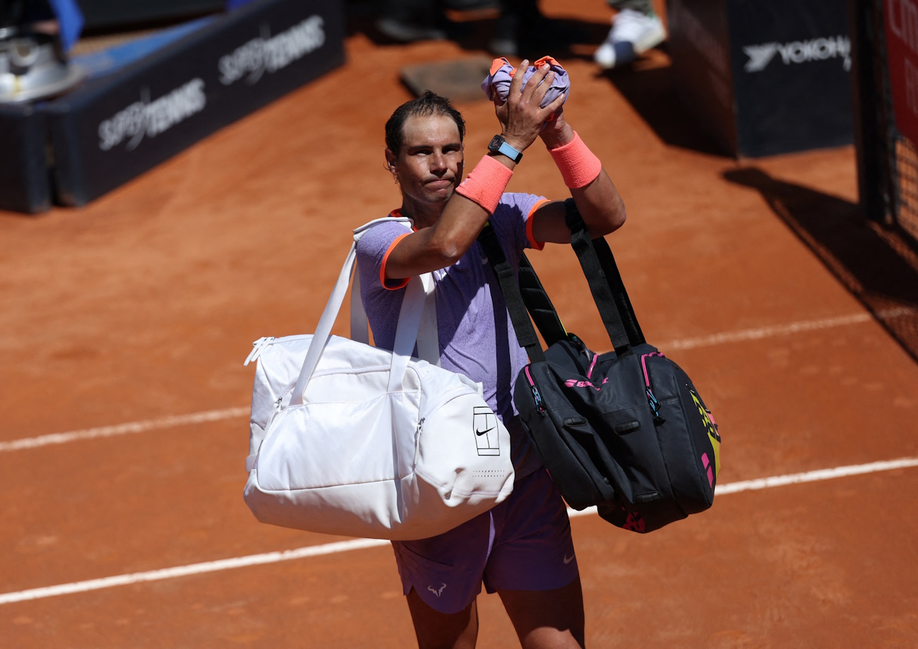 Tennis - Italian Open - Foro Italico, Rome, Italy - May 11, 2024 Spain's Rafael Nadal acknowledges the fans and walks off the court after losing his round of 64 match against Poland's Hubert Hurkacz REUTERS