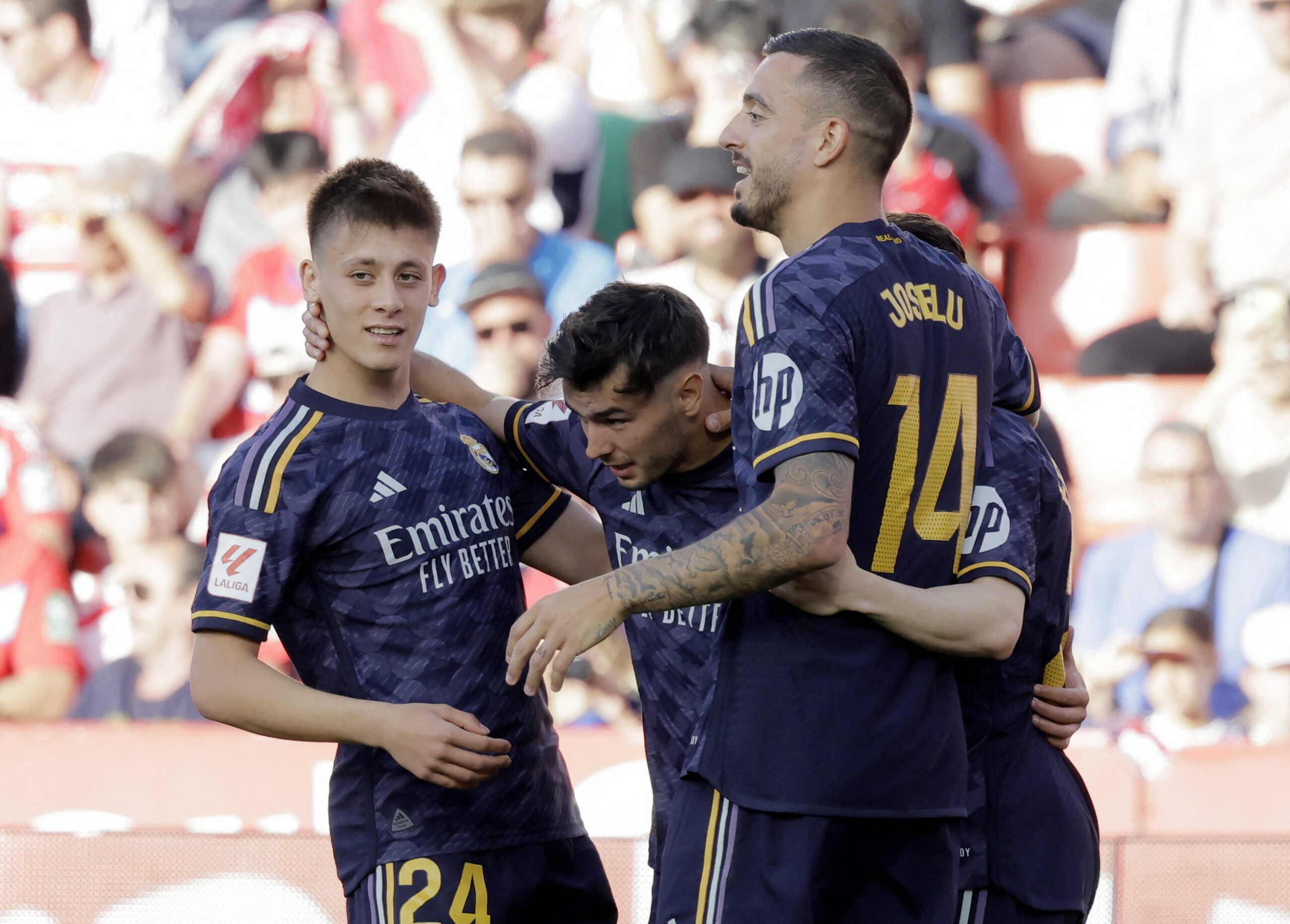 Soccer Football - LaLiga - Granada v Real Madrid - Nuevo Estadio de Los Carmenes, Granada, Spain - May 11, 2024 Real Madrid's Brahim Diaz celebrates scoring their third goal with Arda Guler, Joselu and teammates REUTERS