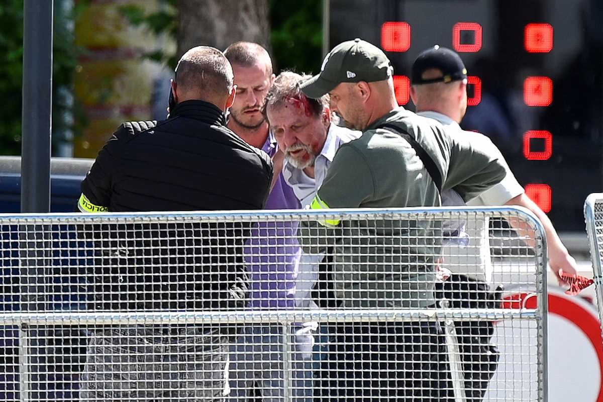 A person is detained after a shooting incident of Slovak Prime Minister Robert Fico, after a Slovak government meeting in Handlova, Slovakia, May 15, 2024. REUTERS