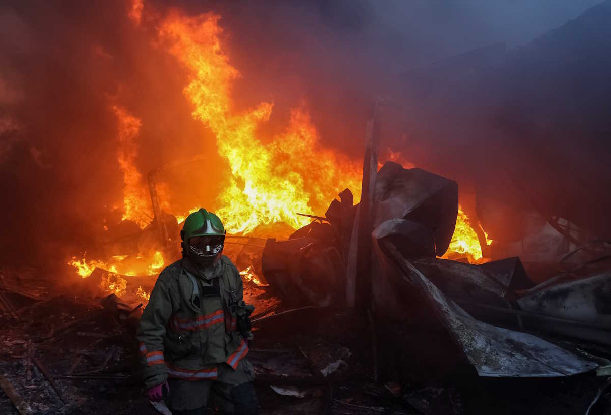 A firefighter works at a site a Russian missile strike, amid Russia's attack on Ukraine, in Kharkiv, Ukraine May 4, 2024. REUTERS