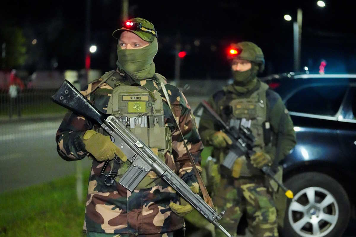 Lithuanian army servicemen patrol on the streets during a temporary curfew introduced during military exercise "Thunder Bastion 24" in Vilnius, Lithuania May 7, 2024. REUTERS