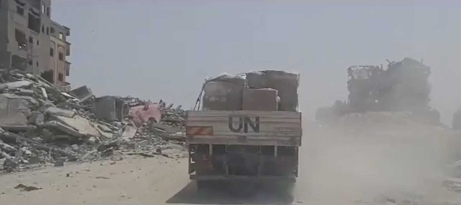 A United Nations (U.N.) truck carries aid to distribute to displaced Palestinians, amid the ongoing conflict between Israel and the Palestinian Islamist group Hamas, in a location given as Jabalia, in the northern Gaza Strip, in this screengrab taken from a handout video released on April 24, 2024. UNRWA