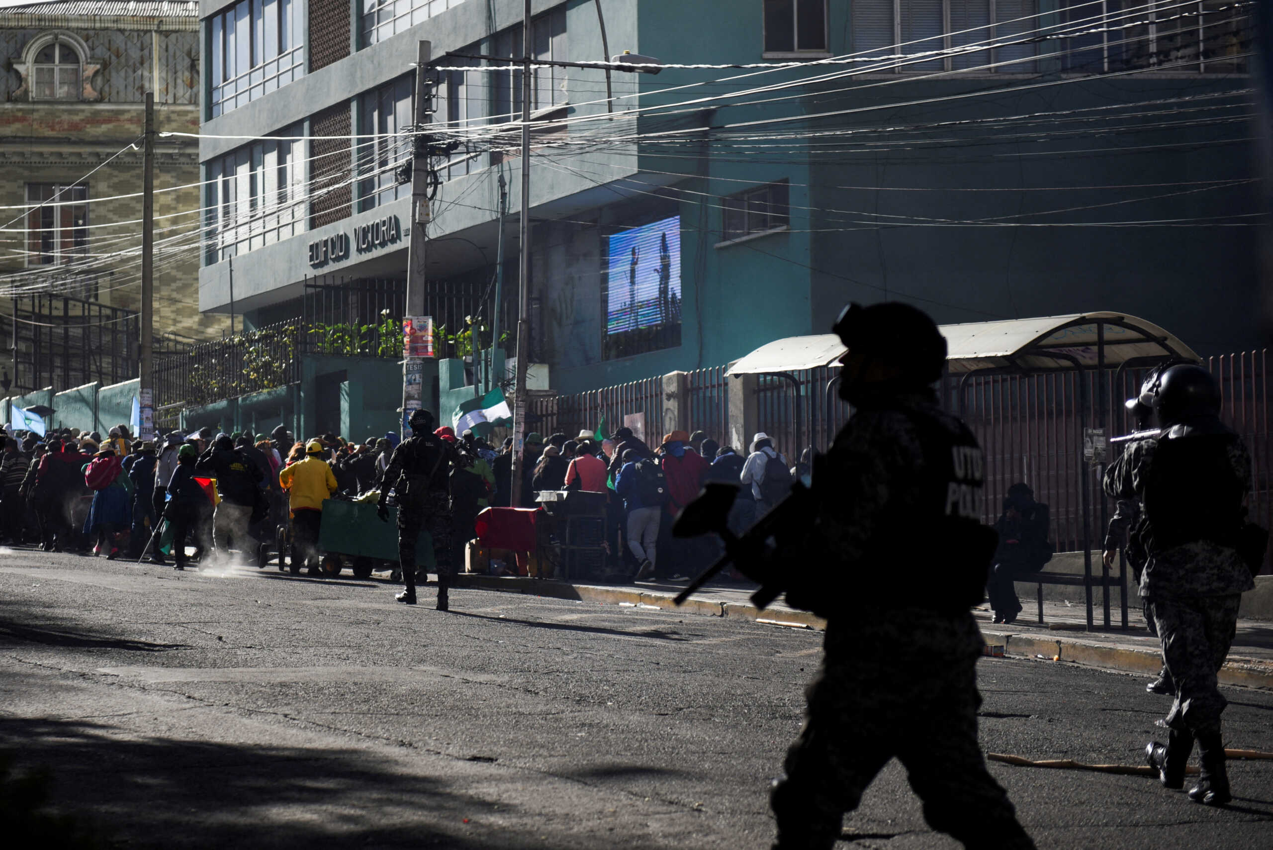 Members of the riot police operate during a teachers' protest against the proposed retirement law, in La Paz, Bolivia, April 22, 2024. REUTERS