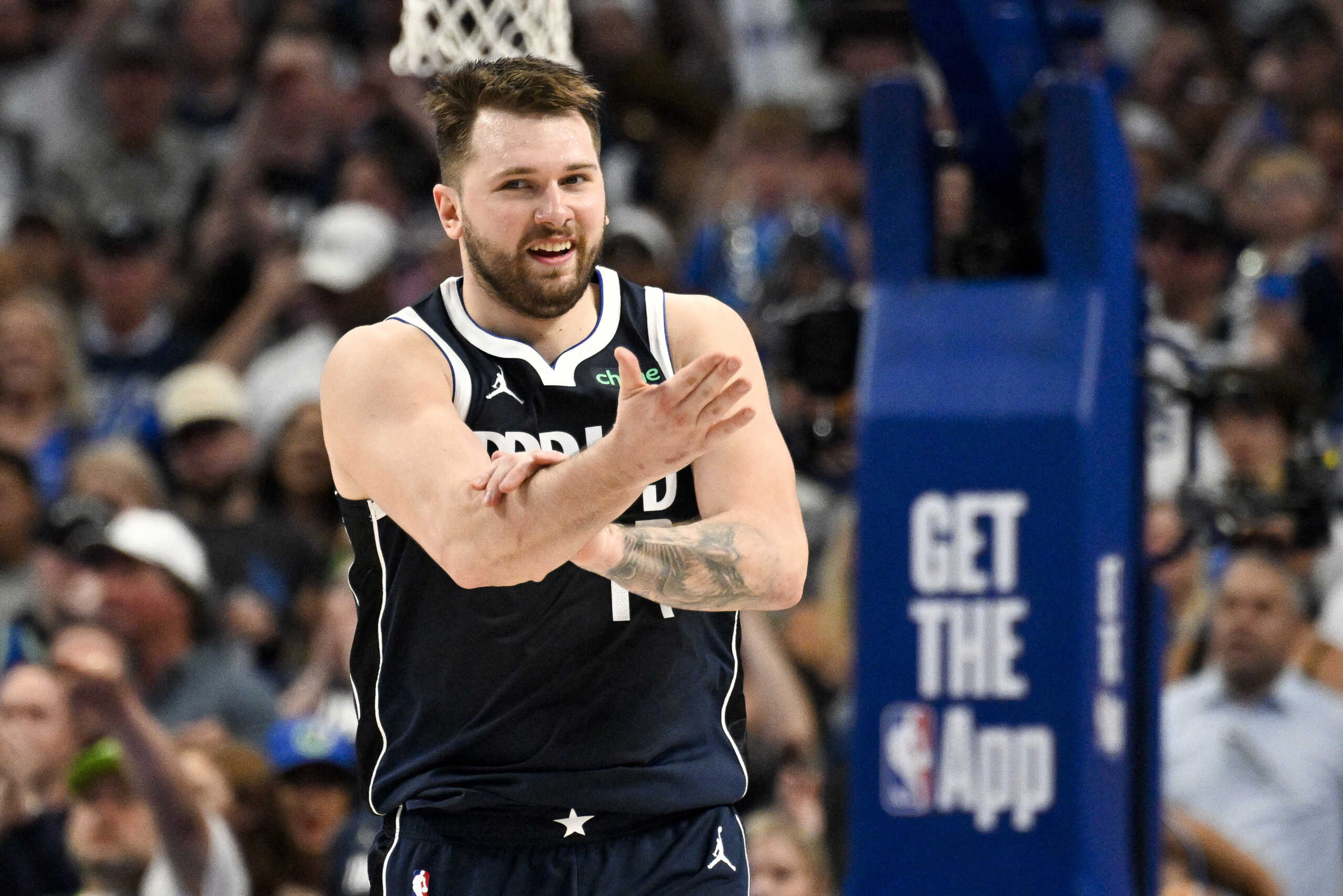 May 26, 2024; Dallas, Texas, USA; Dallas Mavericks guard Luka Doncic (77) reacts to being fouled against the Minnesota Timberwolves during the second half in game three of the western conference finals for the 2024 NBA playoffs at American Airlines Center. Mandatory Credit: Jerome Miron-USA TODAY Sports