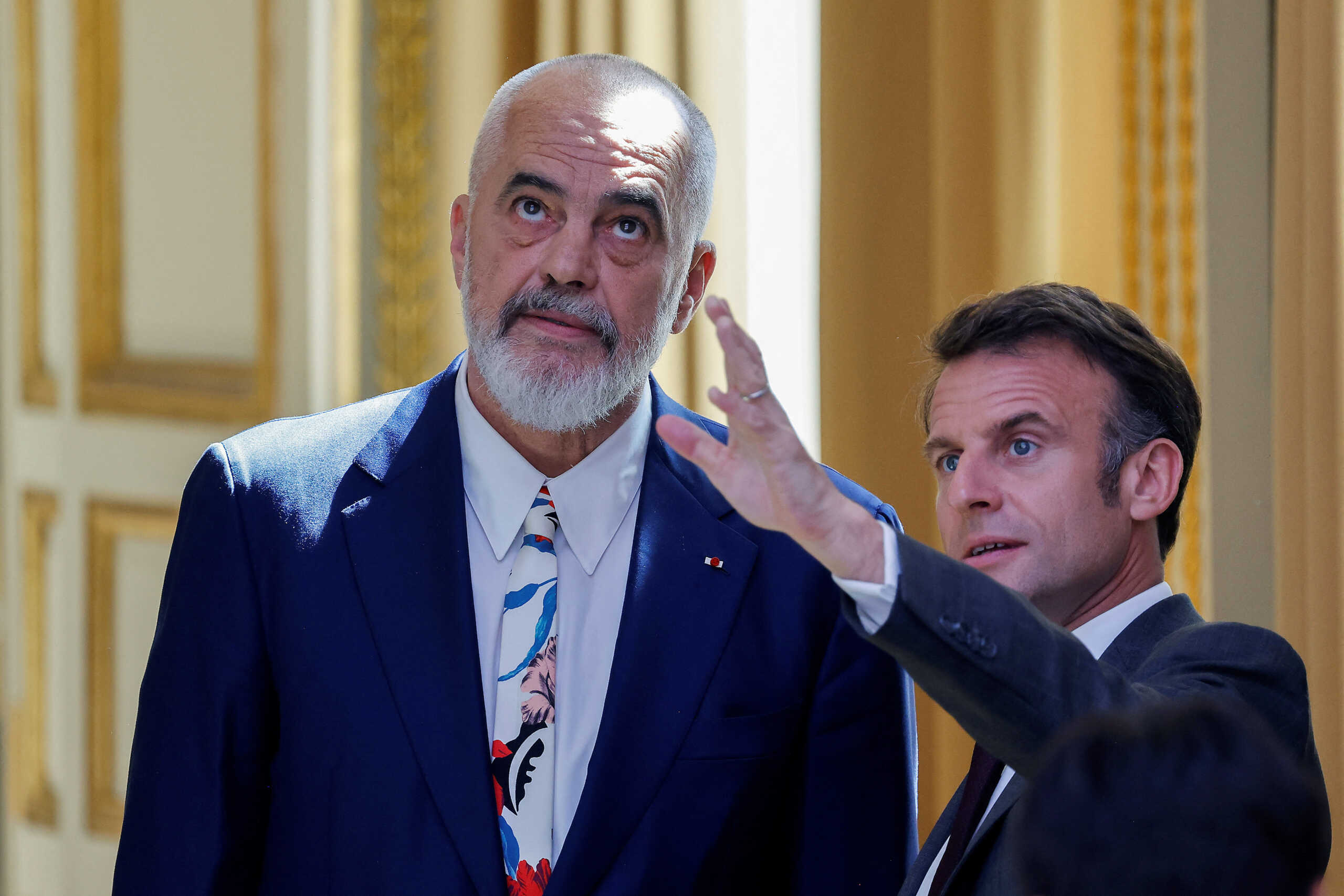 France's President Emmanuel Macron gestures next to Albania's Prime Minister Edi Rama prior to their working lunch at the presidential Elysee Palace, in Paris, France, April 12, 2024.     LUDOVIC MARIN