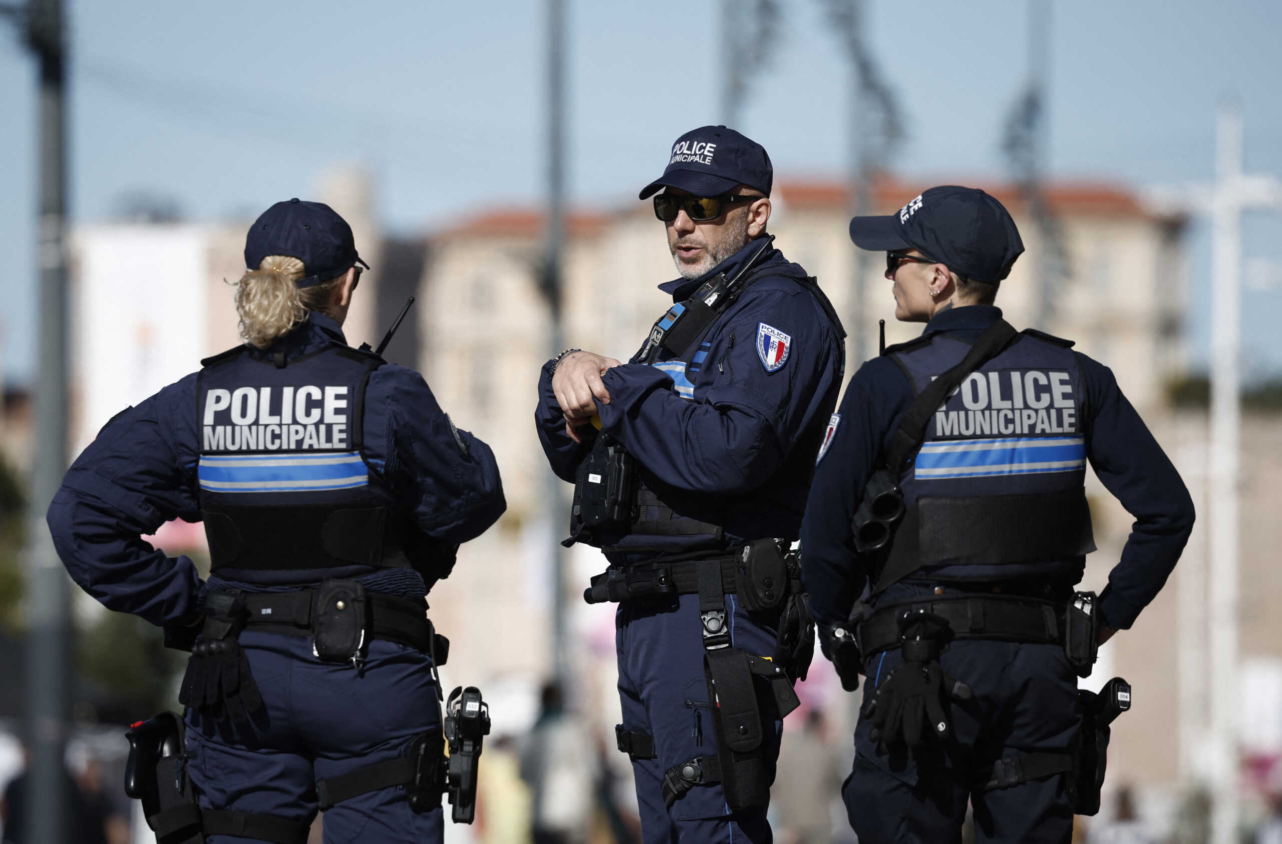 Paris Olympics 2024 - Arrival of the Olympic Flame in Marseille - Marseille, France - May 8, 2024 French police officers patrol the streets in the Old Port before the arrival of the Olympic flame REUTERS