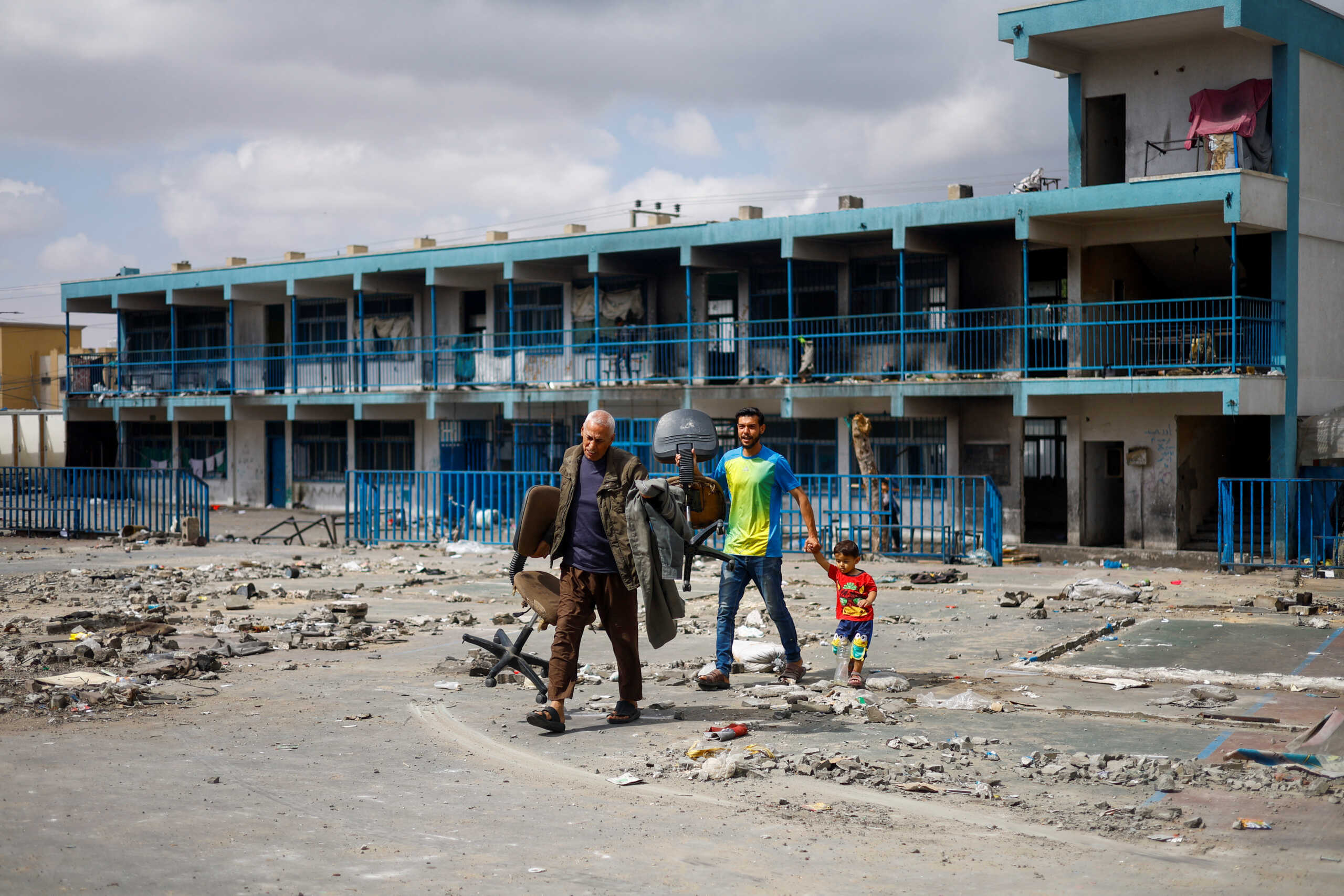 Displaced Palestinians sheltering in a school prepare to flee Rafah after Israeli forces launched a ground and air operation in the eastern part of the southern Gaza City, amid the ongoing conflict between Israel and Hamas, in Rafah, in the southern Gaza Strip May 13, 2024. REUTERS