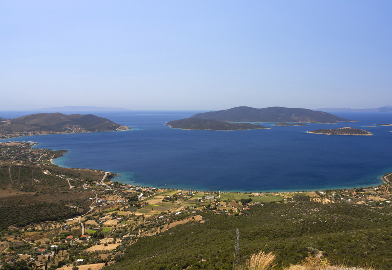 Panoramic view of the Aegean sea and the Greek village near the town of Marmari on the Greek island of Evia in Greece on a Sunny day