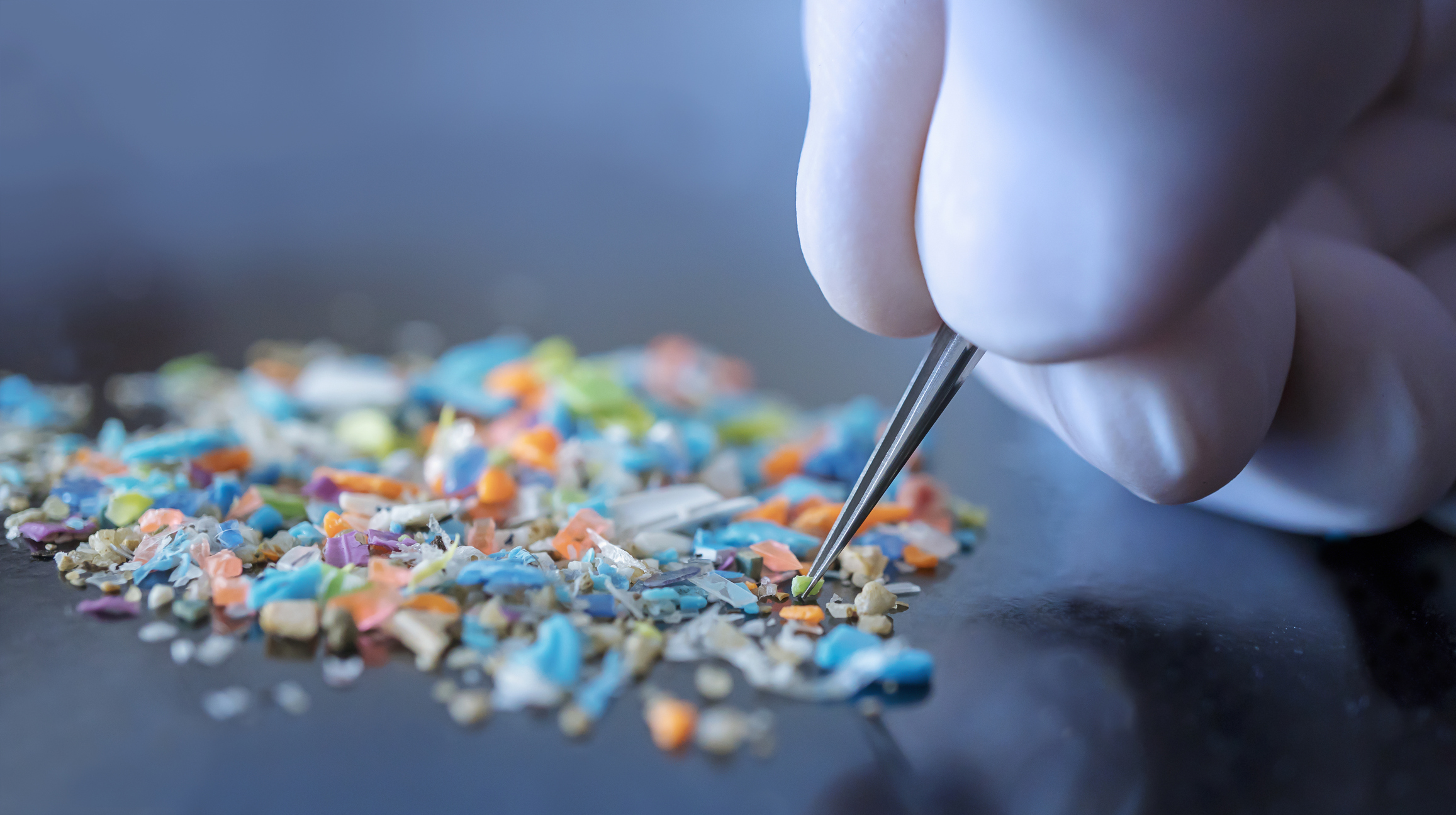 Macro shot of micro plastics. Cool blue filter applied.