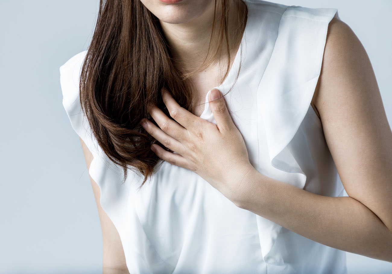 young woman having a heart ache