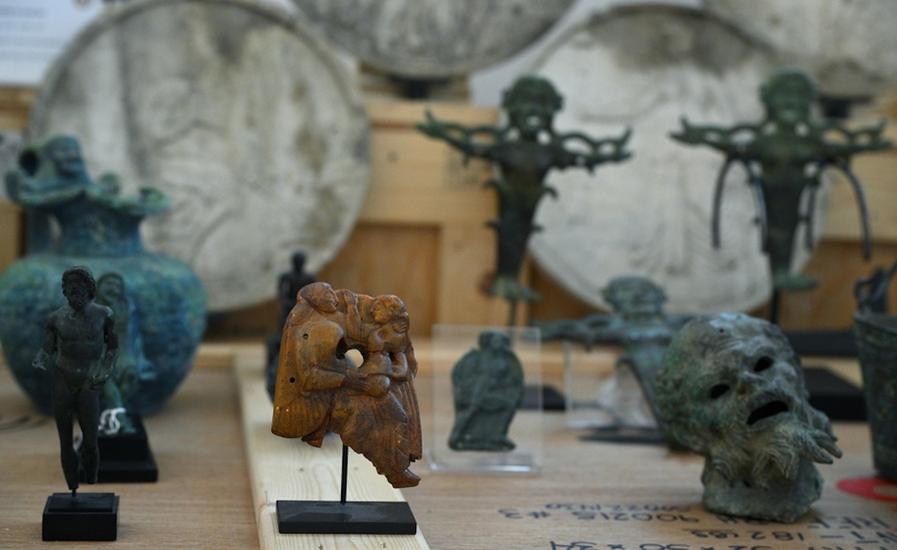 epa11375314 A view of some of the works of art that have been repatriated from the United States of America by the Carabinieri for the Protection of Cultural Heritage (TPC) on display at the Central Institute for Restoration in Rome, Italy, 28 May 2024. The New York District Attorney's Office, Homeland Security Investigations, and Italian authorities worked together to return to Italy about 600 artworks stolen or illegally excavated and recovered in 2023 in the United States, for a value of around 60 million euros. According to the Italian Ministry of Culture, the repatriated works include 600 archaeological relics, 14 numismatic goods, four antiques, two manuscript scrolls and bibliographic material (over 1,000 documents).  EPA