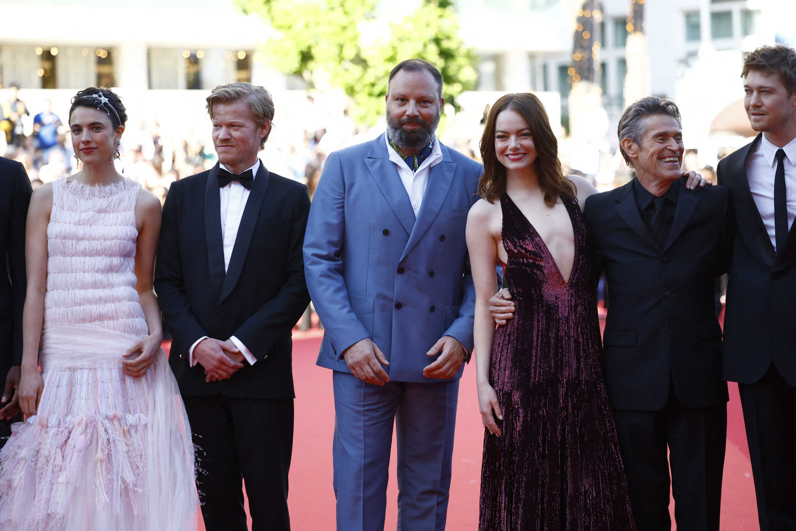 Director Yorgos Lanthimos, cast members Margaret Qualley, Joe Alwyn, Willem Dafoe, Emma Stone and Jesse Plemons pose on the red carpet during arrivals for the screening of the film "Kinds of Kindness" in competition at the 77th Cannes Film Festival in Cannes, France, May 17, 2024. REUTERS
