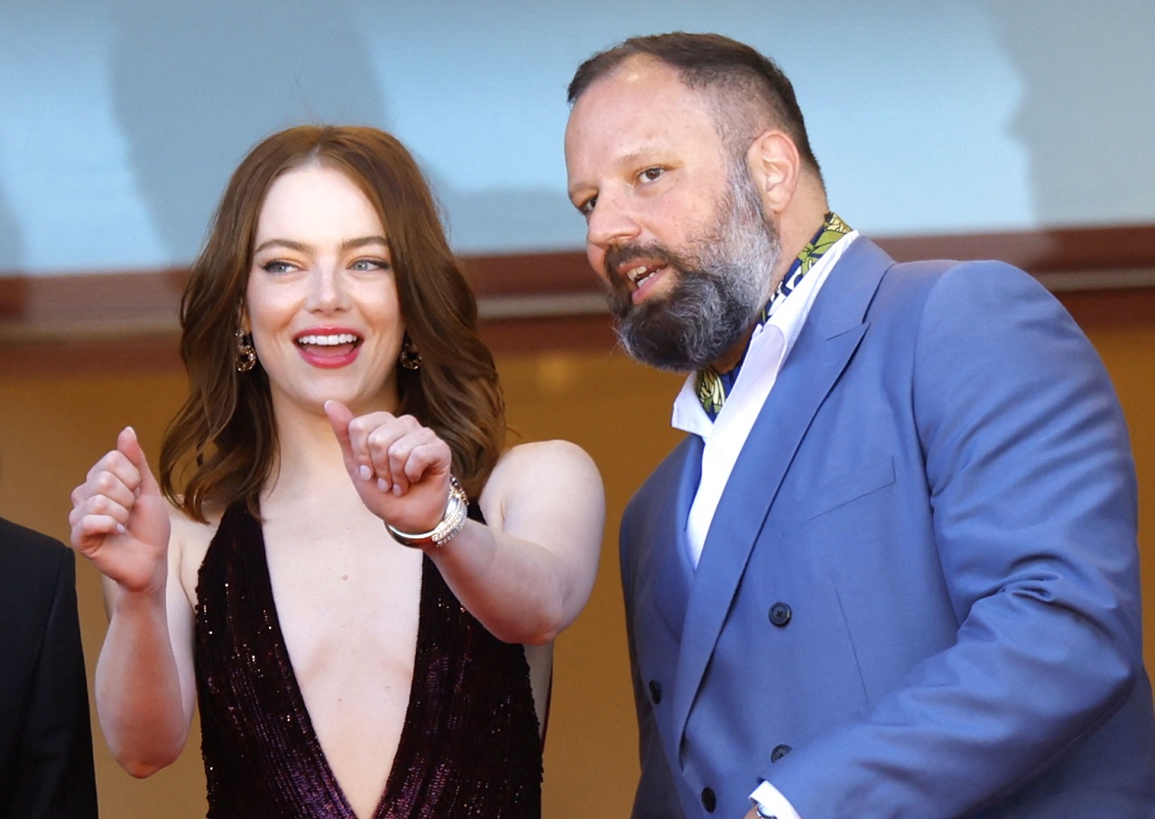 Director Yorgos Lanthimos and cast member Emma Stone pose on the red carpet during arrivals for the screening of the film "Kinds of Kindness" in competition at the 77th Cannes Film Festival in Cannes, France, May 17, 2024. REUTERS