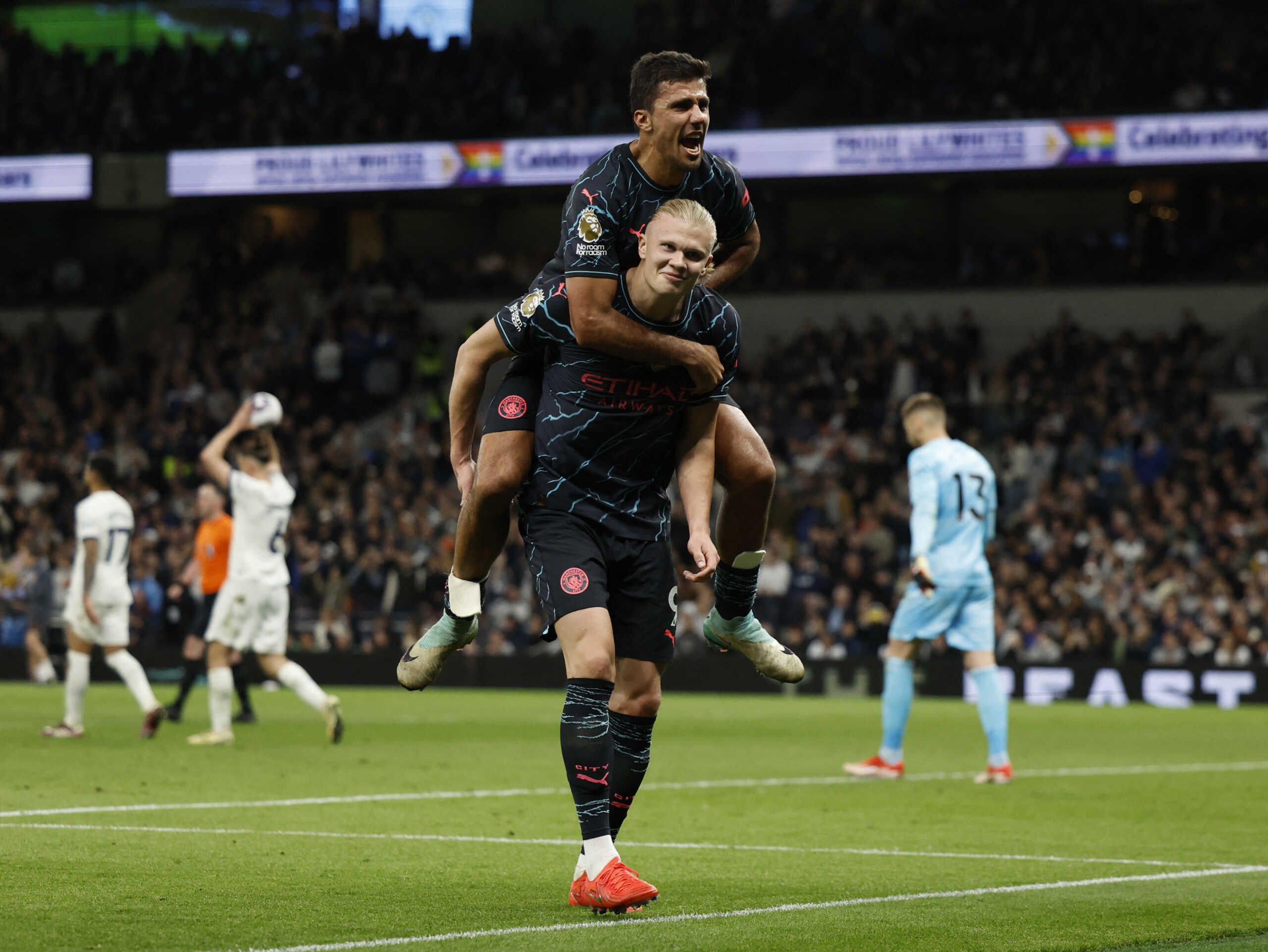 Soccer Football - Premier League - Tottenham Hotspur v Manchester City - Tottenham Hotspur Stadium, London, Britain - May 14, 2024 Manchester City's Erling Braut Haaland celebrates scoring their second goal with Rodri Action Images via Reuters
