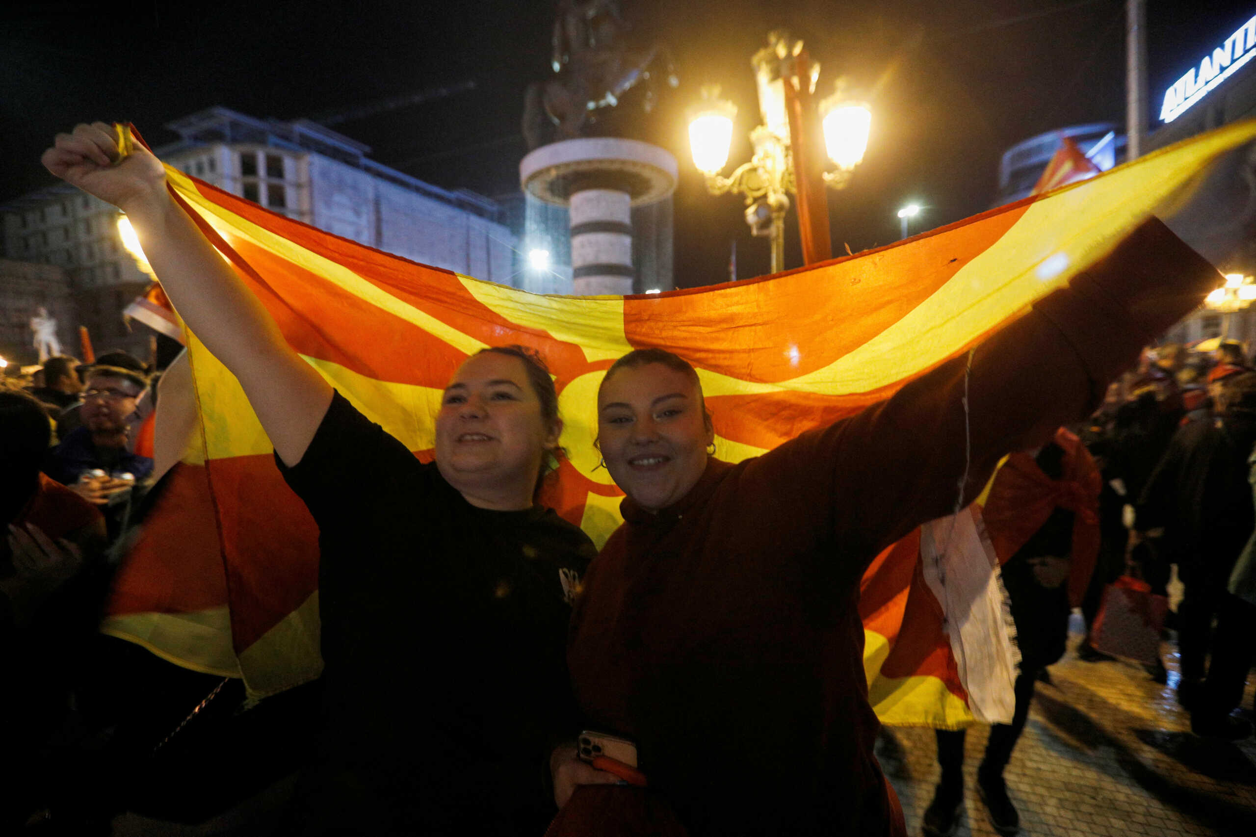 Supporters of VMRO-DPMNE party celebrate following the parliamentary and presidential elections in Skopje, North Macedonia May 8, 2024. REUTERS