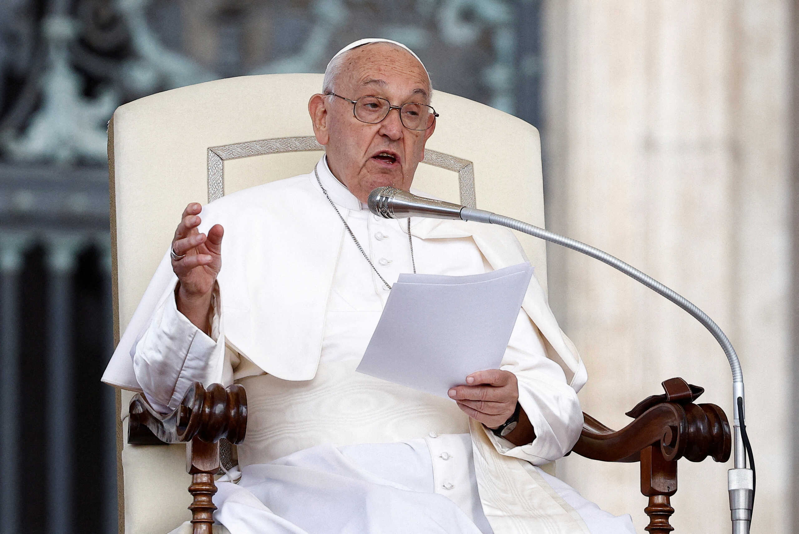 FILE PHOTO: Pope Francis attends the weekly general audience, in Saint Peter Square at the Vatican, May 22, 2024. REUTERS
