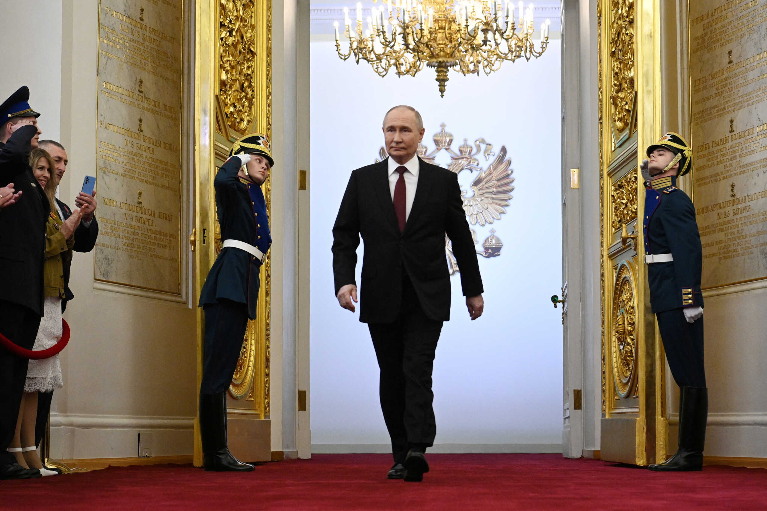 Russian President Vladimir Putin walks before his inauguration ceremony at the Kremlin in Moscow, Russia May 7, 2024. Sputnik